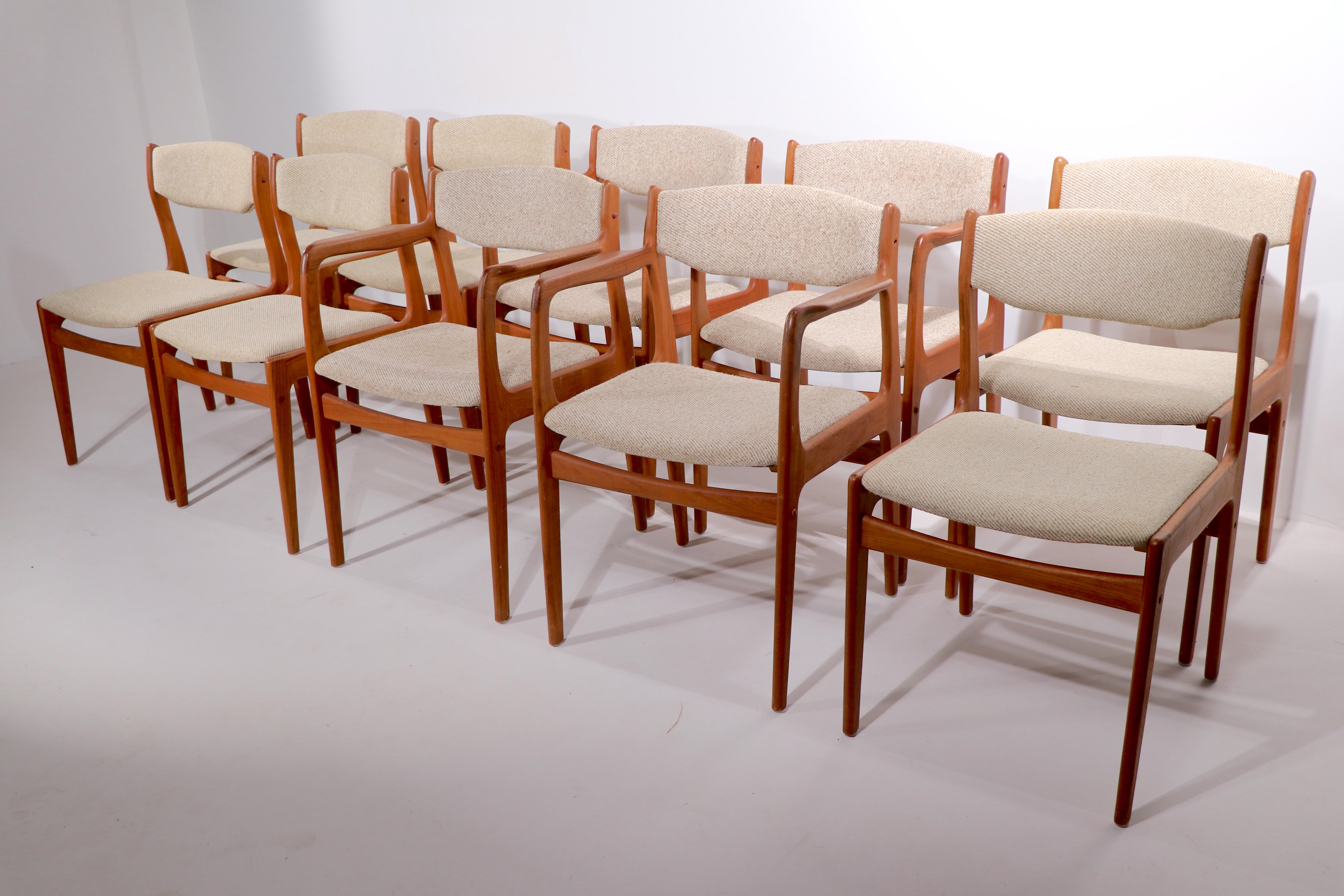 Nice large set of ten Danish Mid-Century Modern dining chairs attributed to Erik Buch for Odense Maskinsnedkeri. Unusual to find a set of ten, perfect for a very large dining, or conference table setting. Solid teak frames, upholstered seats and