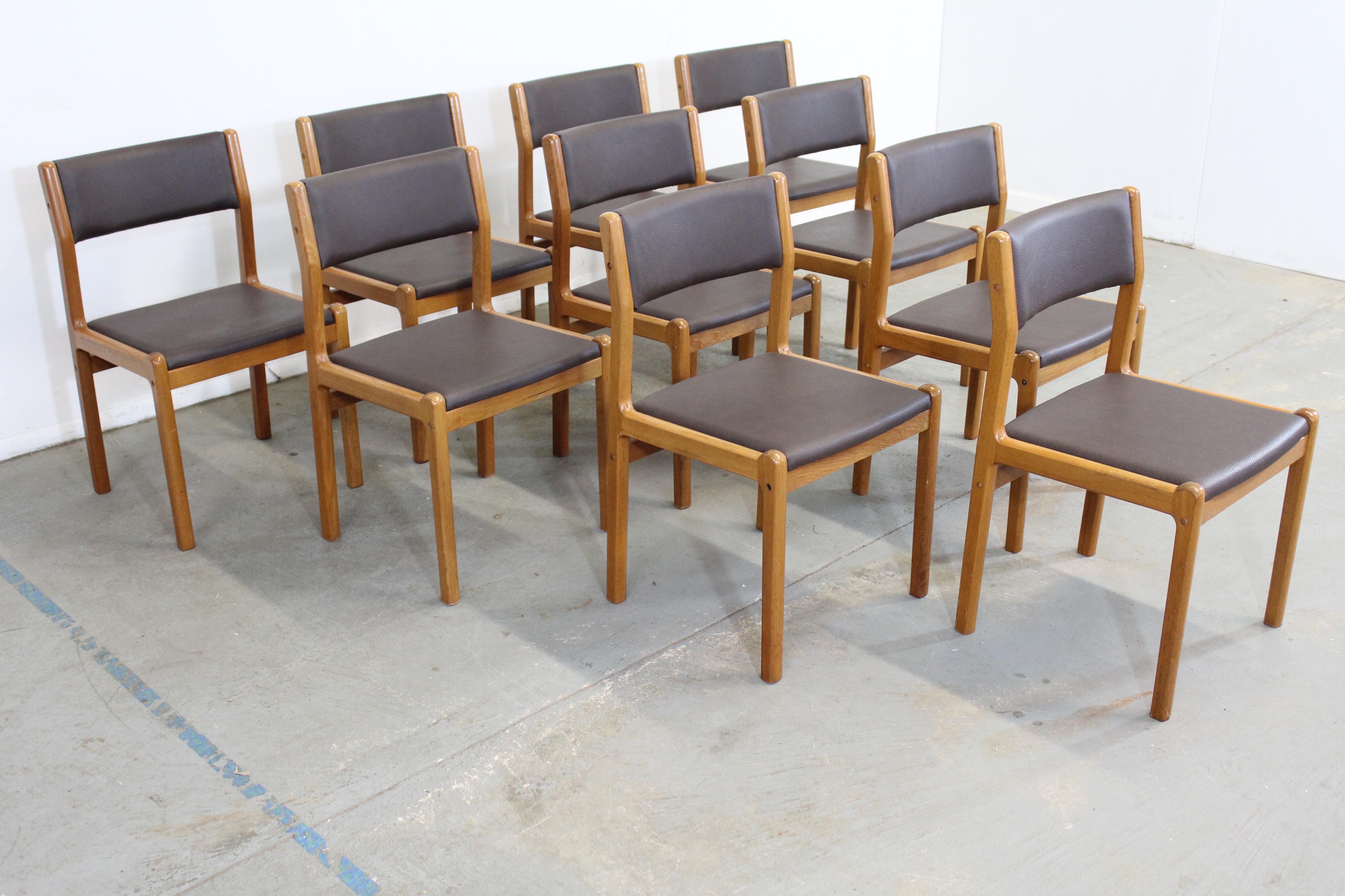 Set of 10 Mid-Century Modern teak side dining chairs 

Offered is a vintage set of Set of 10 Danish Modern JL Moeller teak side dining chairs. They are in good vintage condition. Shows minor stains, surface scratches, age wear. They are