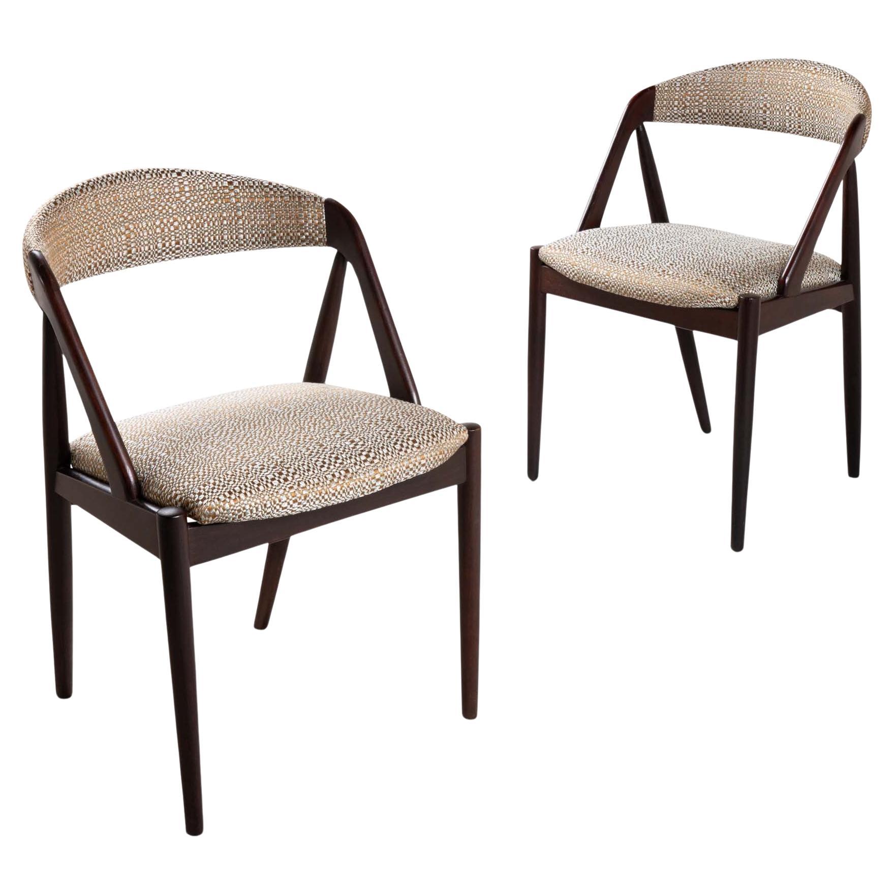 Set of 4 dark teak chairs by Kai Kristiansen