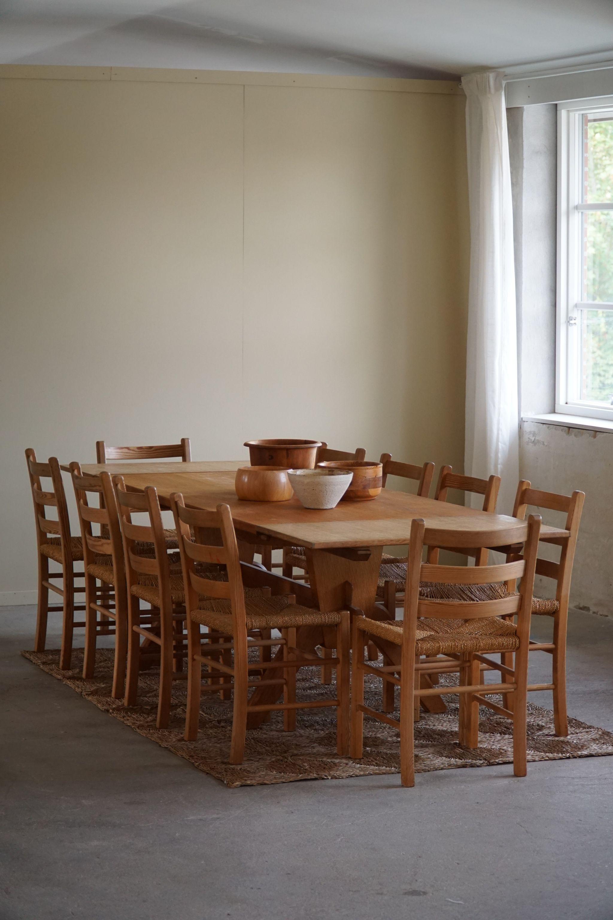 A charming and rustic set of 10 dining chairs in pine and seagrass seats. Made in the 1960s by a Danish cabinetmaker. 
A fine mid century brutalist set that pairs well with many types of interior styles. A Modern, Bohemian, Scandinavian or Classic