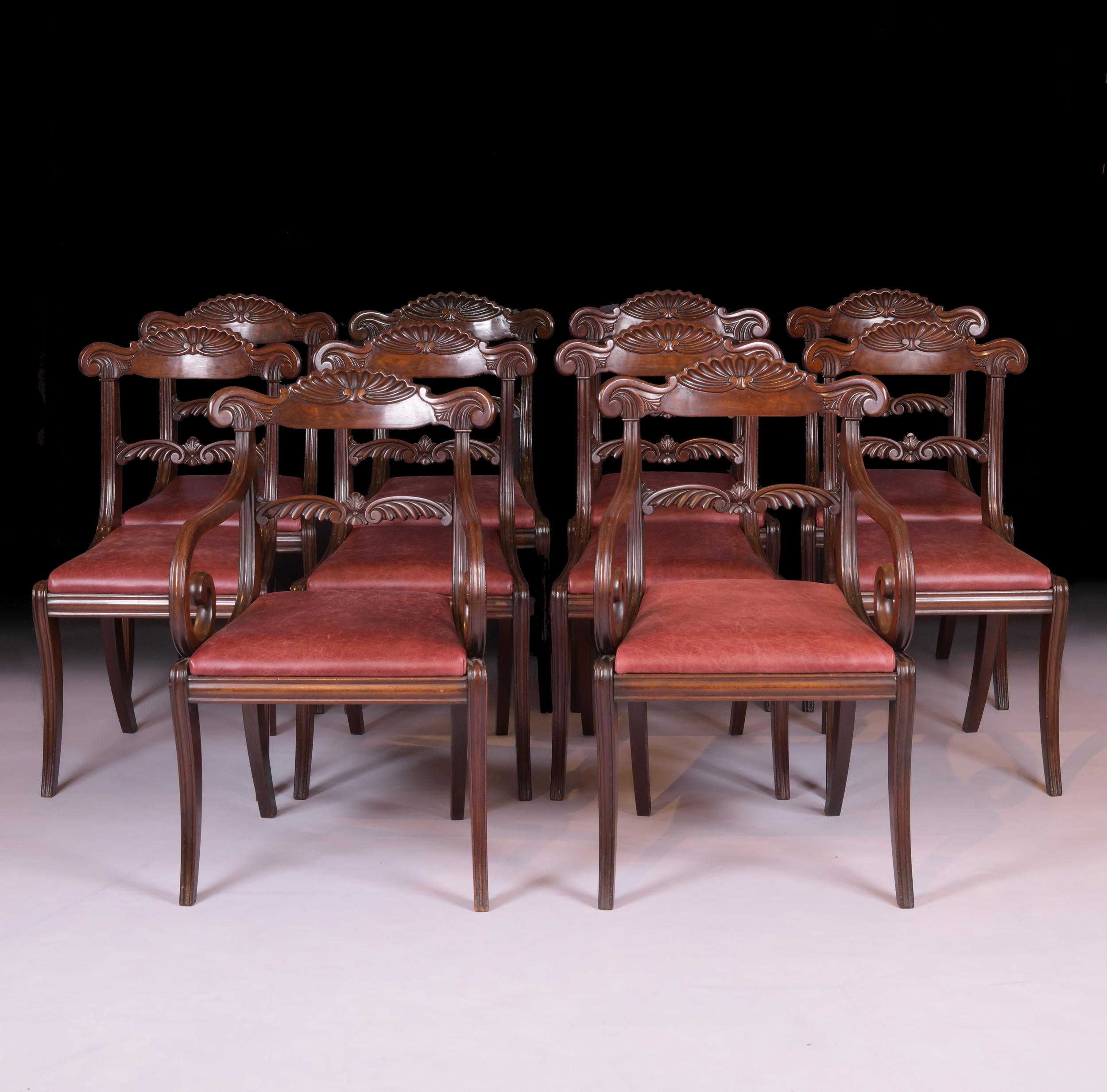 Eine außergewöhnliche Reihe von 10 IRegency Mahagoni Esszimmerstühle, Der Satz, bestehend aus acht Stühlen und zwei Sesseln, jeweils mit durchbrochenen gewölbten oberen Schiene, mit Akanthusblättern und Schriftrollen geschnitzt, die Bar zurück mit