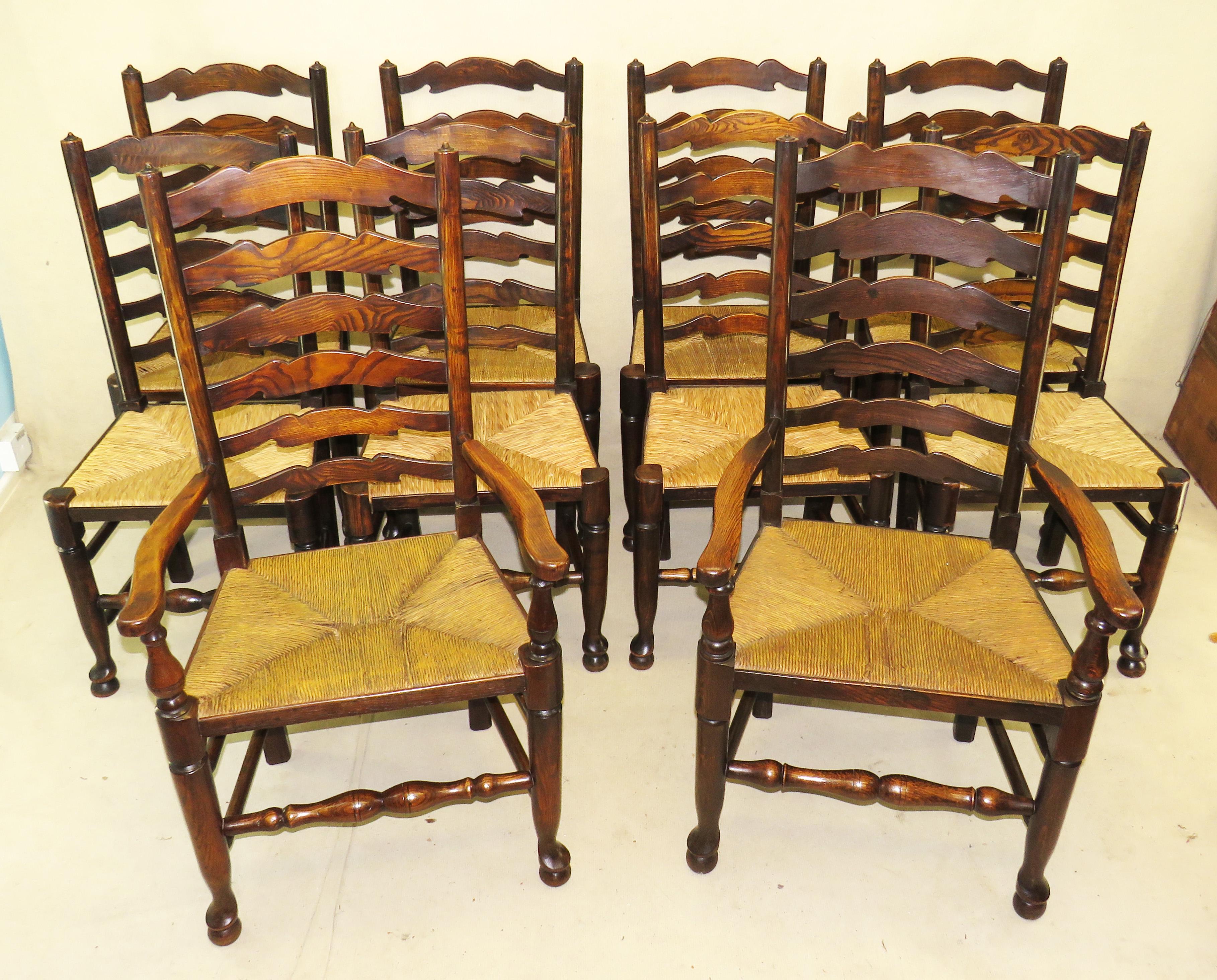 A delightful set of 10 matched late 19th century
English ash and elm ladder back country design
farmhouse dining chairs consisting of 8 single chairs
and 2 armchairs having elegant wavy ladderbacks
over rushed seats raised on turned legs
and