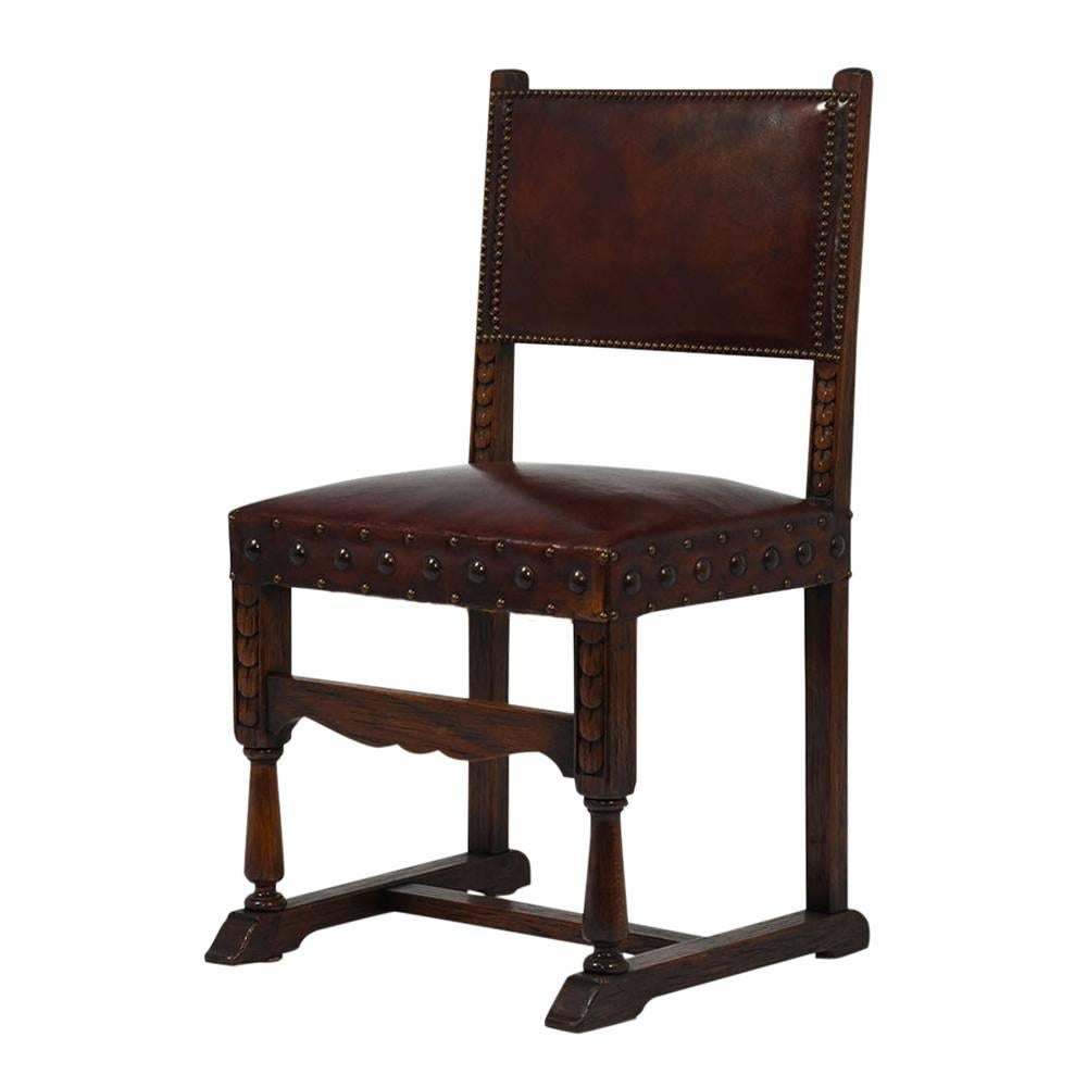 Carved Set of Ten French Spanish Style Leather Dining Chairs