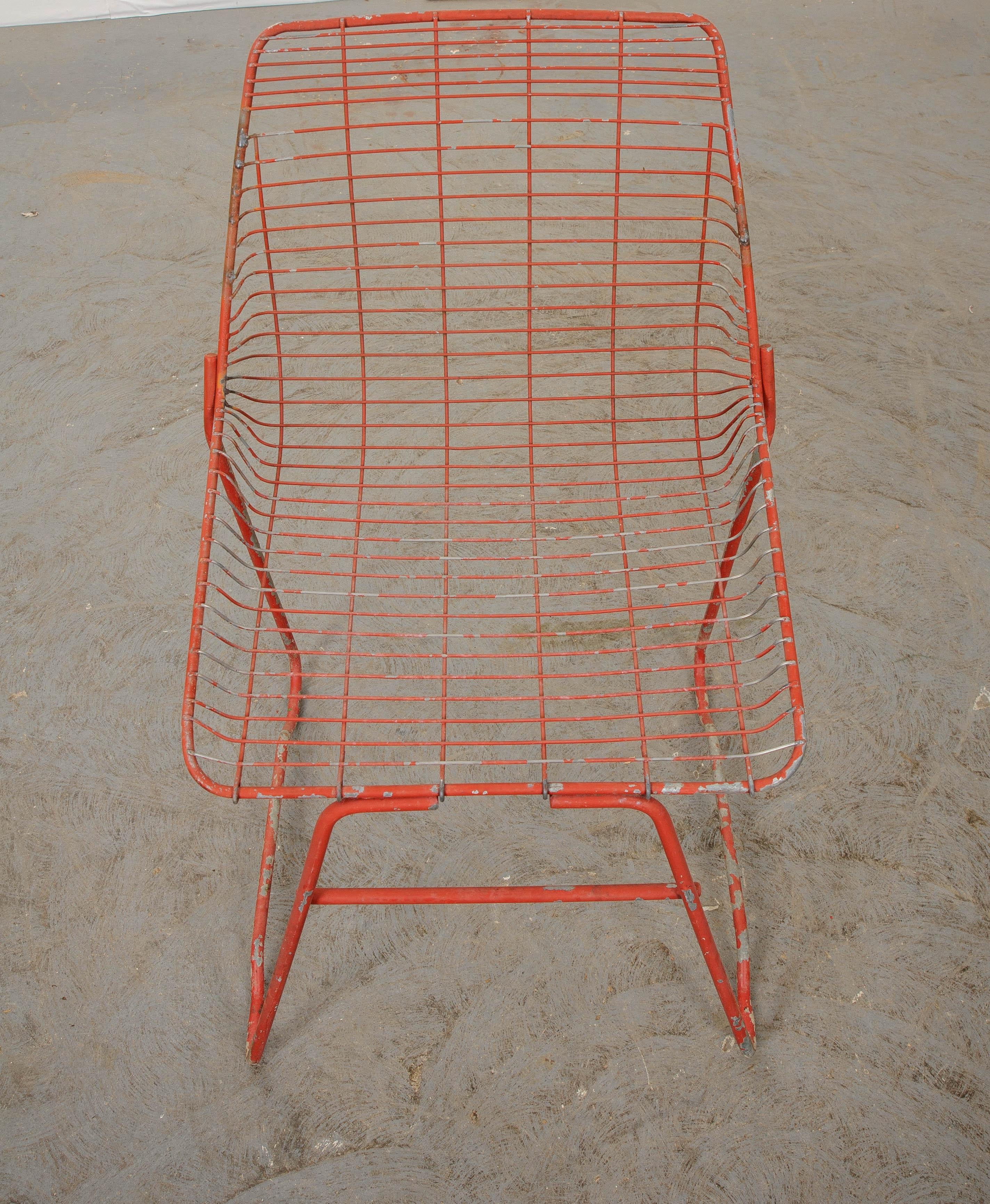 A fantastic set of painted garden chairs from 20th century, France. The chairs have seats and backs that are formed from molded metal grids. This technique gives the chairs a modern style that is both fashionable and comfortable. They are currently