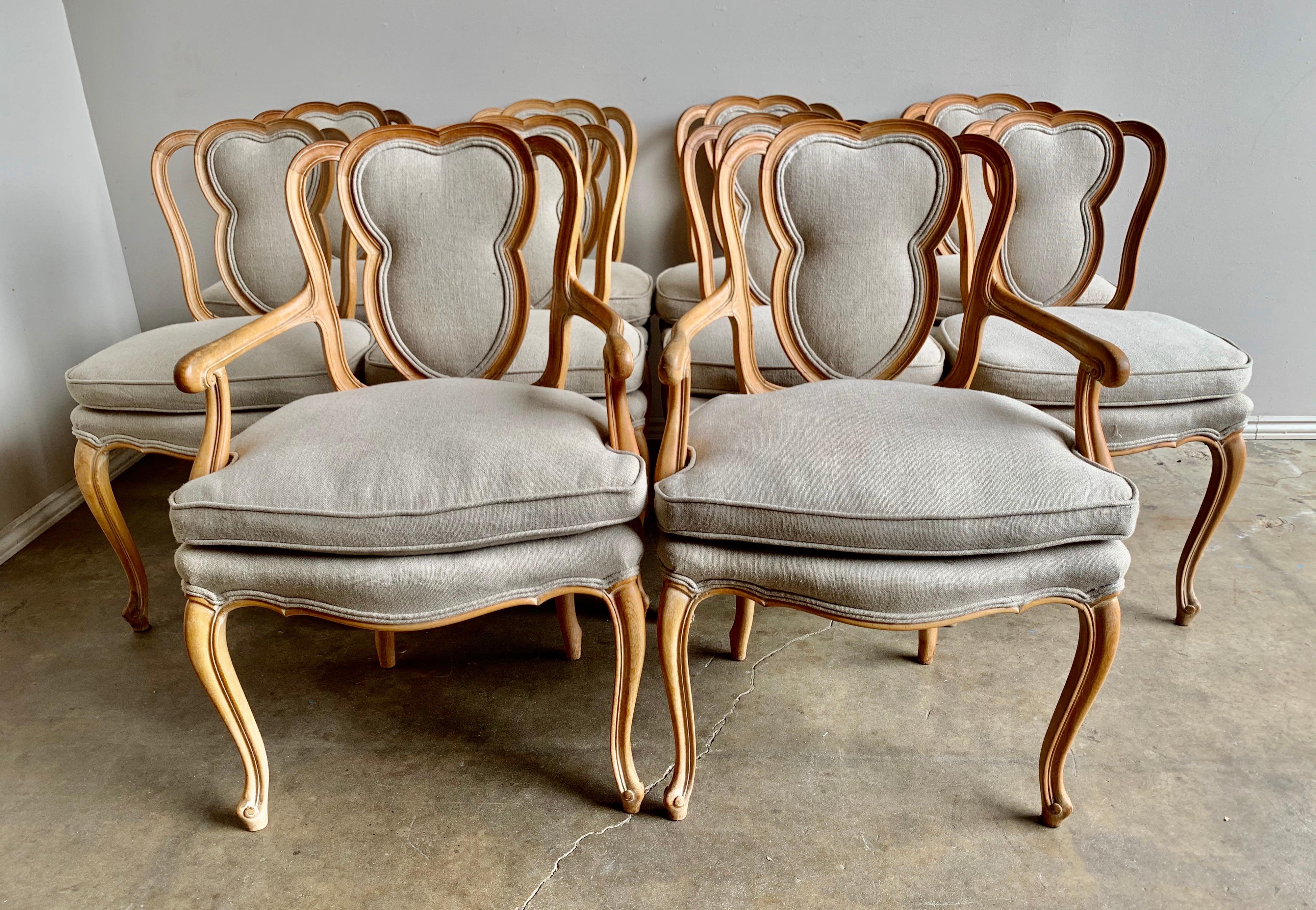 Set of (10) French Louis XV style dining chairs that are newly upholstered in a washed Belgium linen. Loose seat cushions. Measures: Armchairs 24” W x 26” D x 46” H
Side chairs 20” x 20” x 35” H
21” seat height.