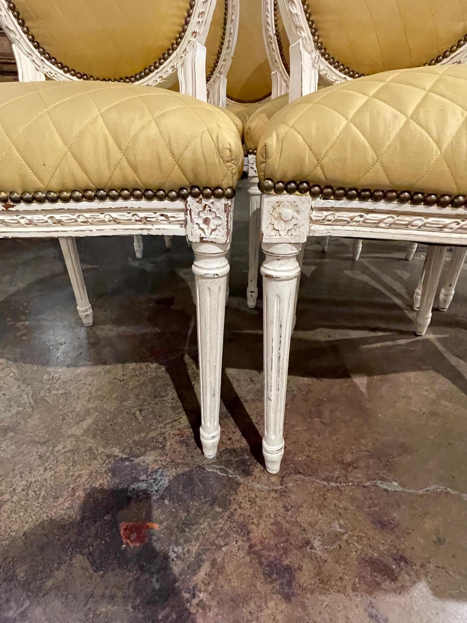 Upholstery Set of 10 French Louis XVI Style Carved and Painted Dining Chairs