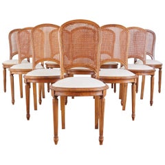 Set of 10 French Louis XVI Style Walnut Caned Dining Chairs
