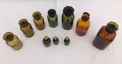 Set of 10 French Perfume-Pharmacy Bottles in Green and Amber, with Lids/Stopper
