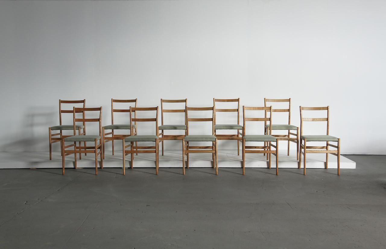 A wonderful set of ten original, early Gio Ponti Leggera Model 646 dining chairs, Cassina, Italy, 1950s. In restored condition with new upholstery. All with maker’s label marked 'Figli di Amedeo Cassina' under each seat.   Fast shipping