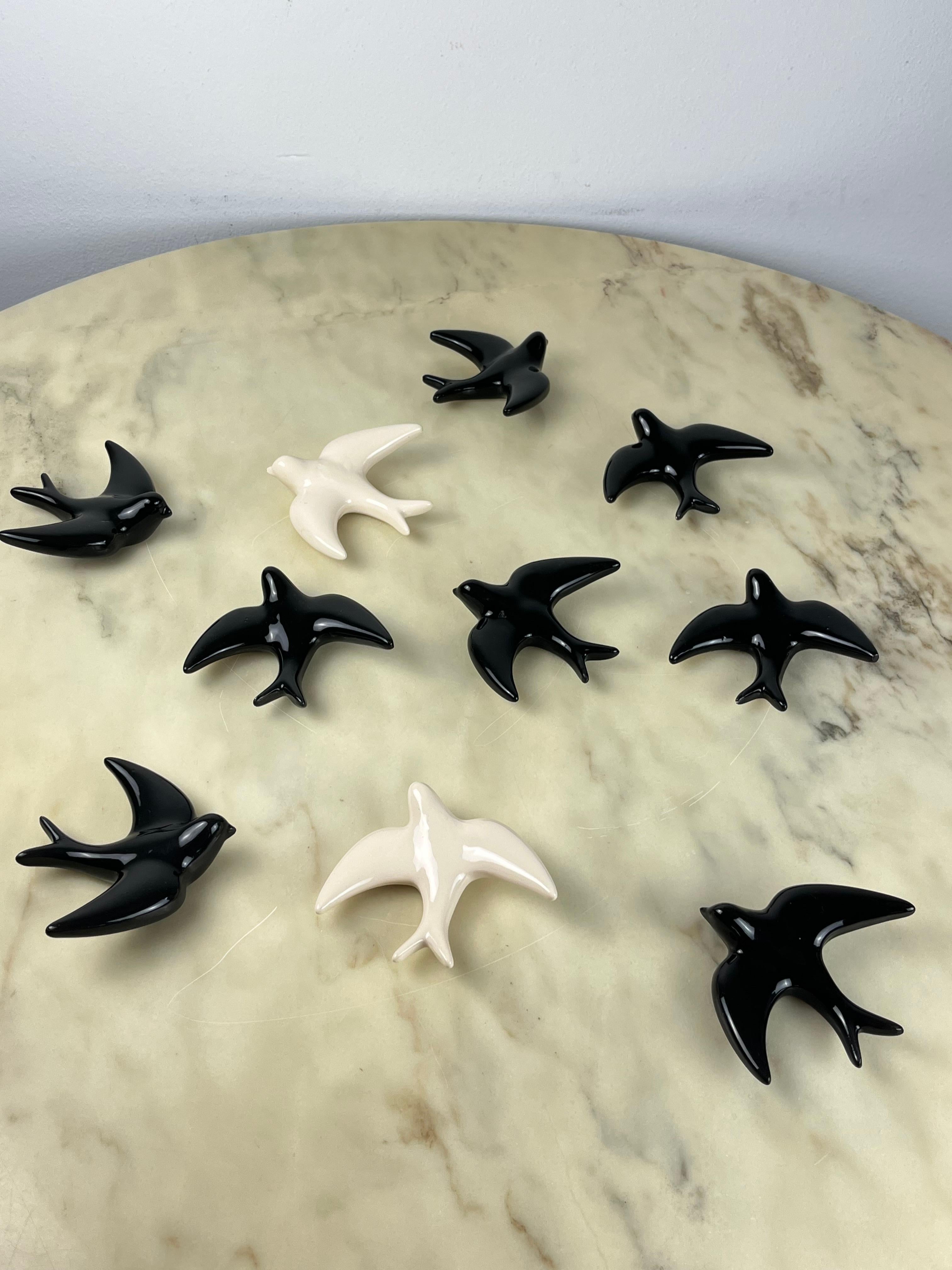 Set of 10 glazed ceramic swallows, Italy, 1960s
Delightful vintage ornaments, depicting a flock of birds in flight.
Intact. Excellent condition with imperceptible signs of aging. Eight are dark and two are light.