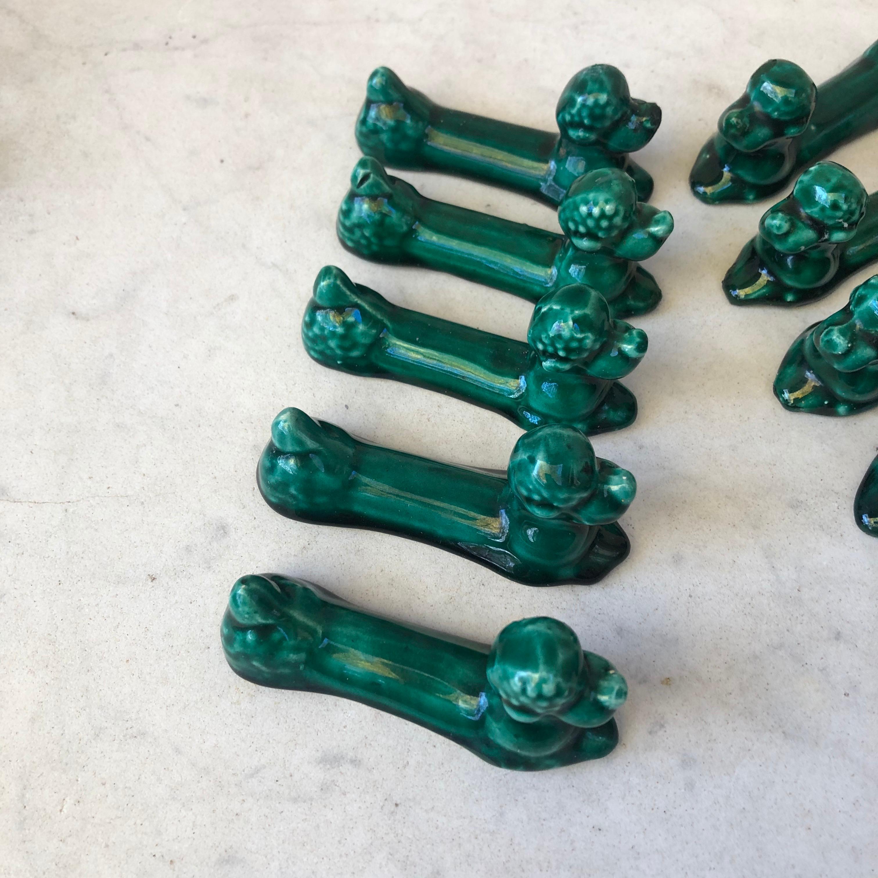 Set of 10 green Majolica knife rests with poodles dogs.
Vallauris, circa 1950.

  