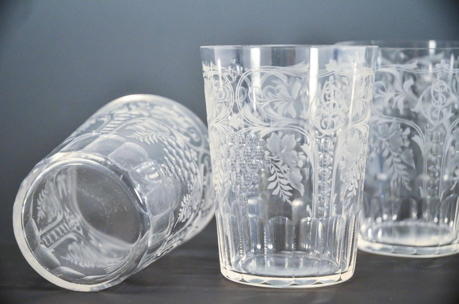 These are the perfect set of 10 wheel cut tumblers ready for your favorite cocktail. The special order glasses are hand blown crystal and masterfully engraved with an overall 