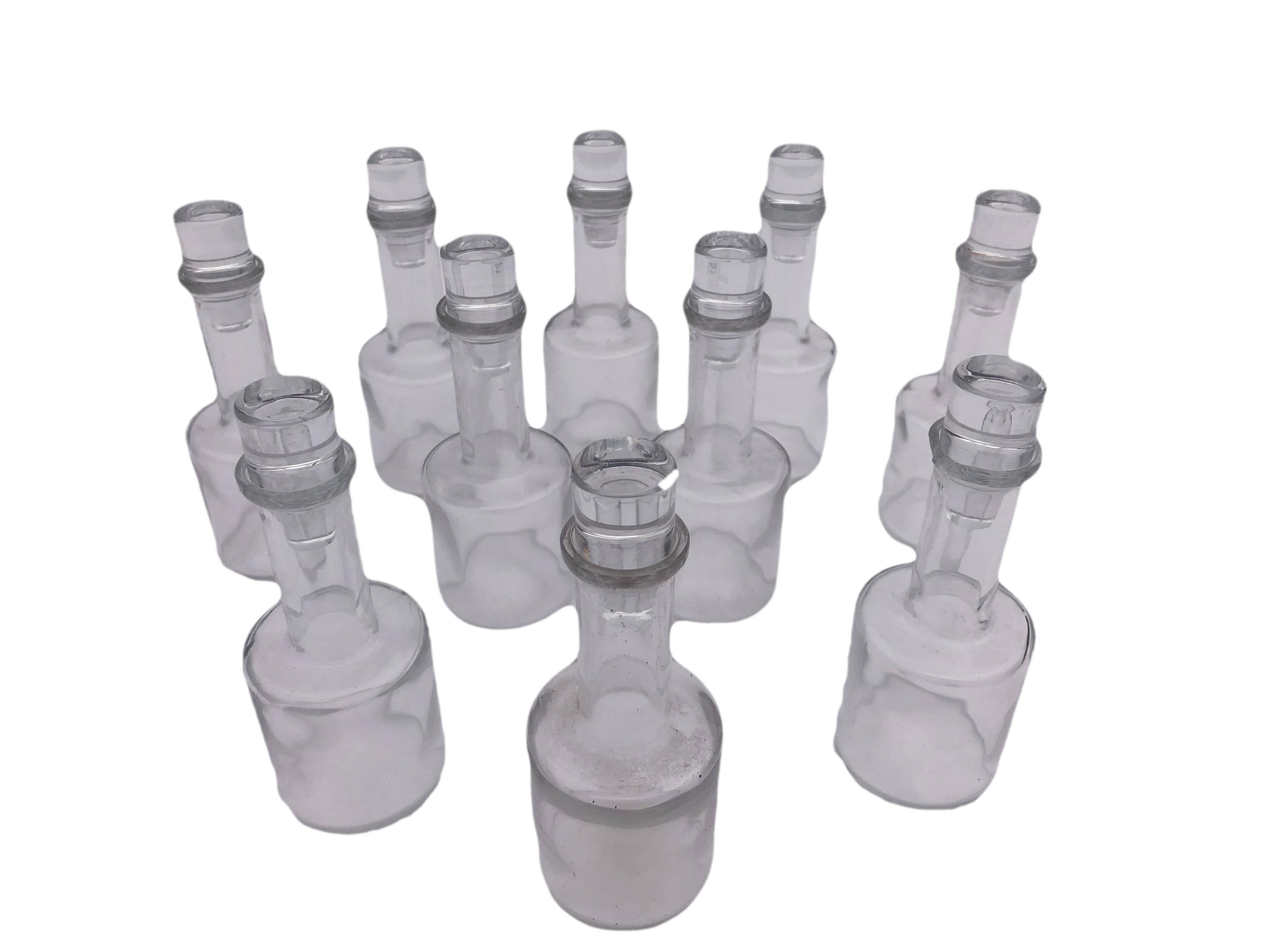 French Set of 10 Hand Blown Glass Bottles with Stoppers from a Parisian Restaurant For Sale