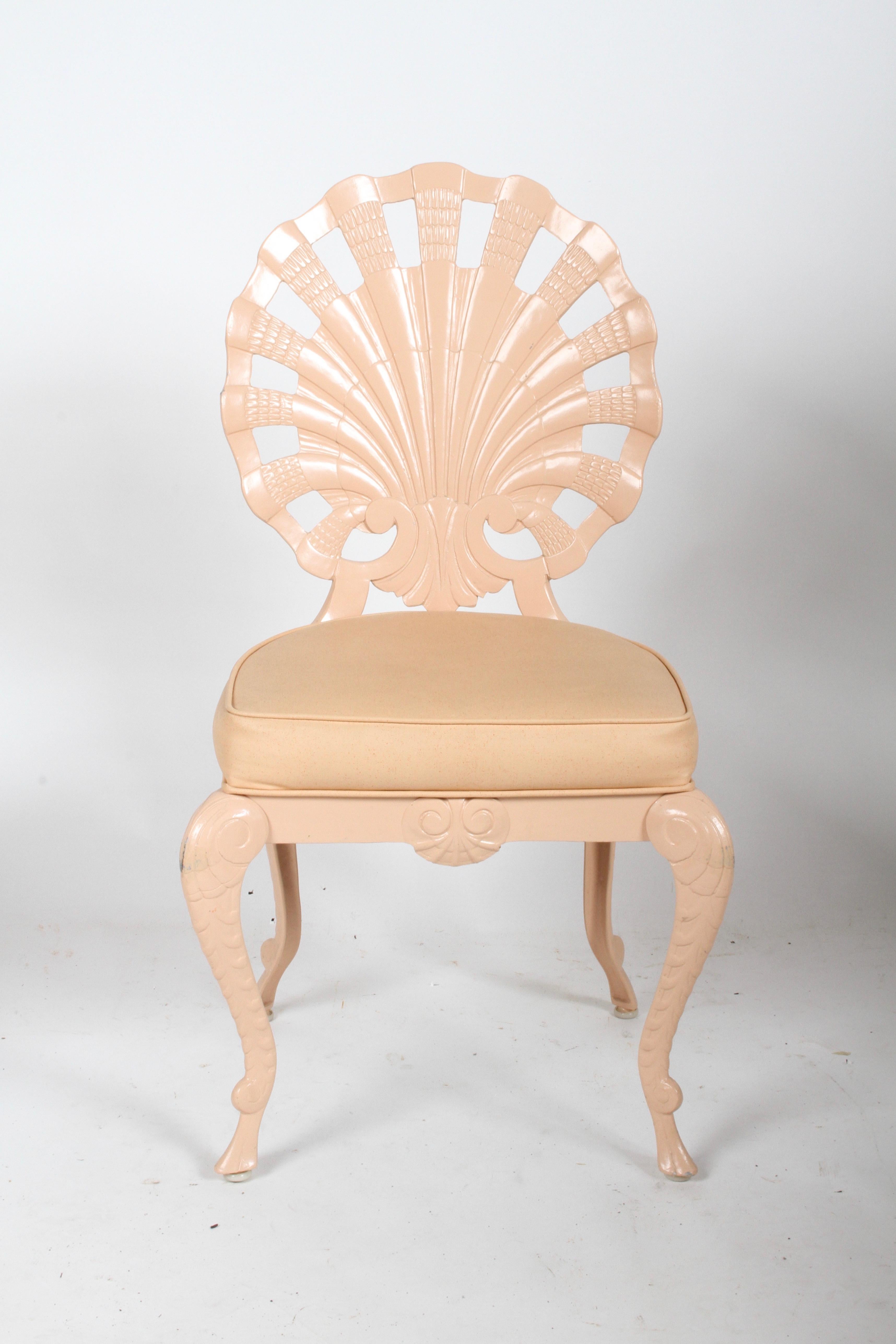 1970s Hollywood Regency set of 10 Grotto style cast aluminum side chairs with shell form backs, with original pink paint and seats on cabriole legs. Paint shows wear, should be repainted in perfection is sought or if other color is desired. Please