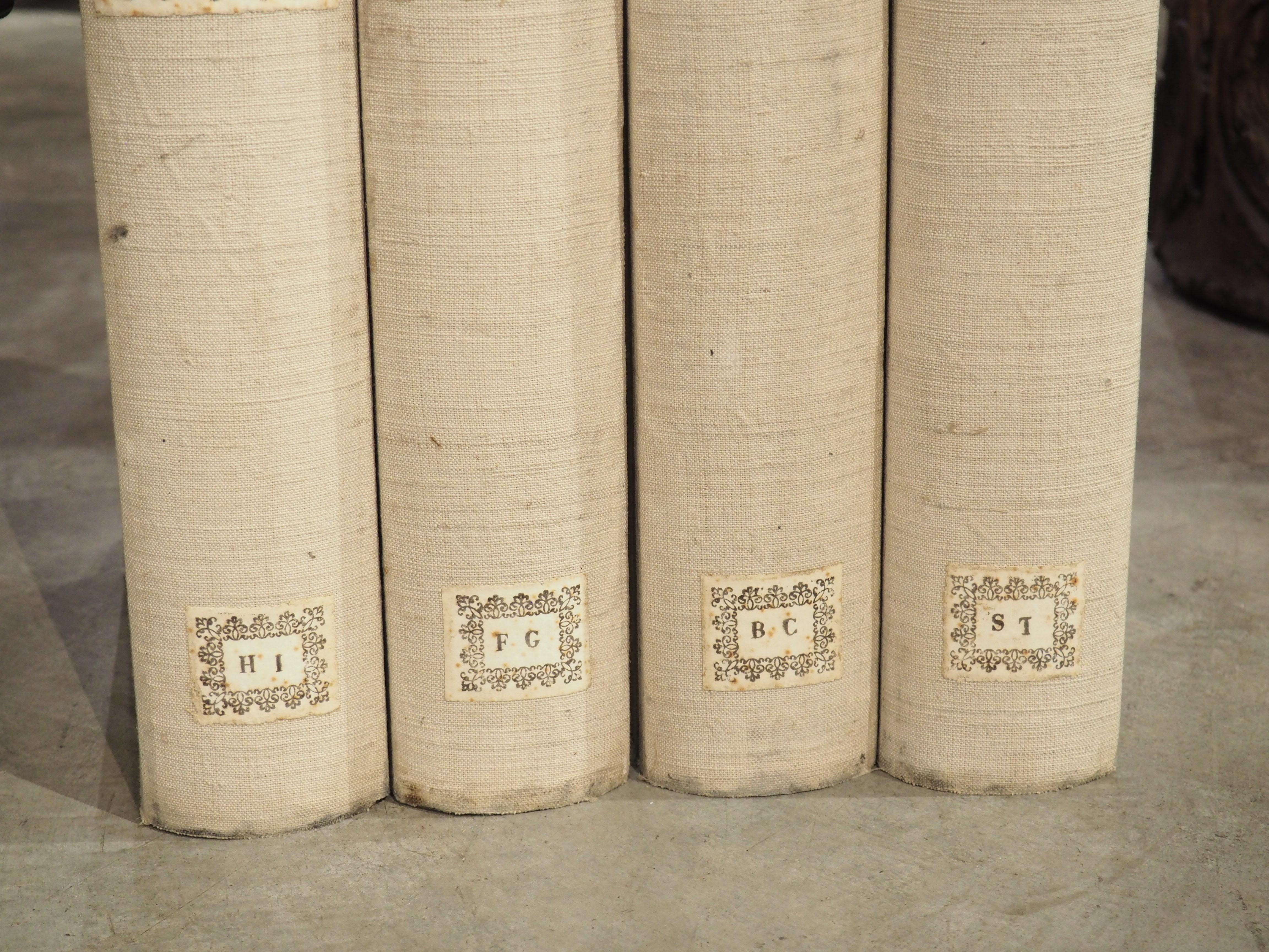 More information coming soon…

A set of 10 Italian document boxes, dating to circa 1915, in the form of books.  Made from cream colored boards, each book has a different identification number and letter range on the beige linen spine.  Each book has
