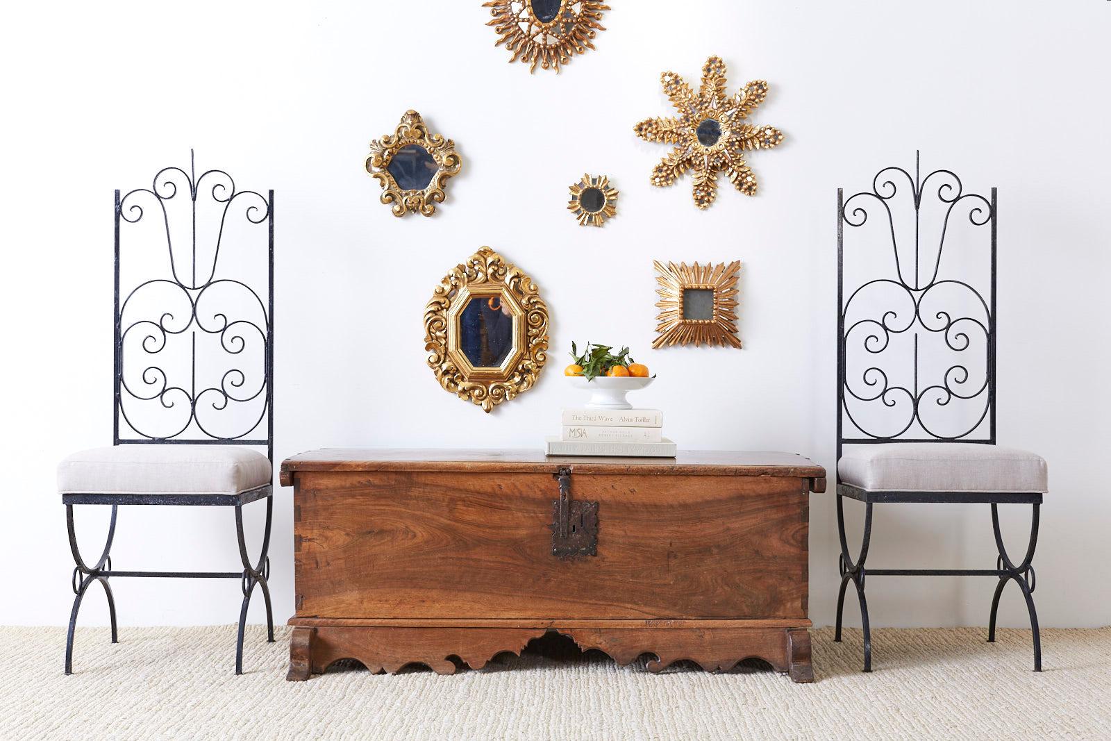 Fantastic assembled set hand carved Italian giltwood mirrors made in the Baroque taste. The set consists of 2 small starburst mirrors, 1 square, 3 medium, 2 large stars, 1 oblong, and 1 large mirror. The mirrors feature an aged patina on the finish