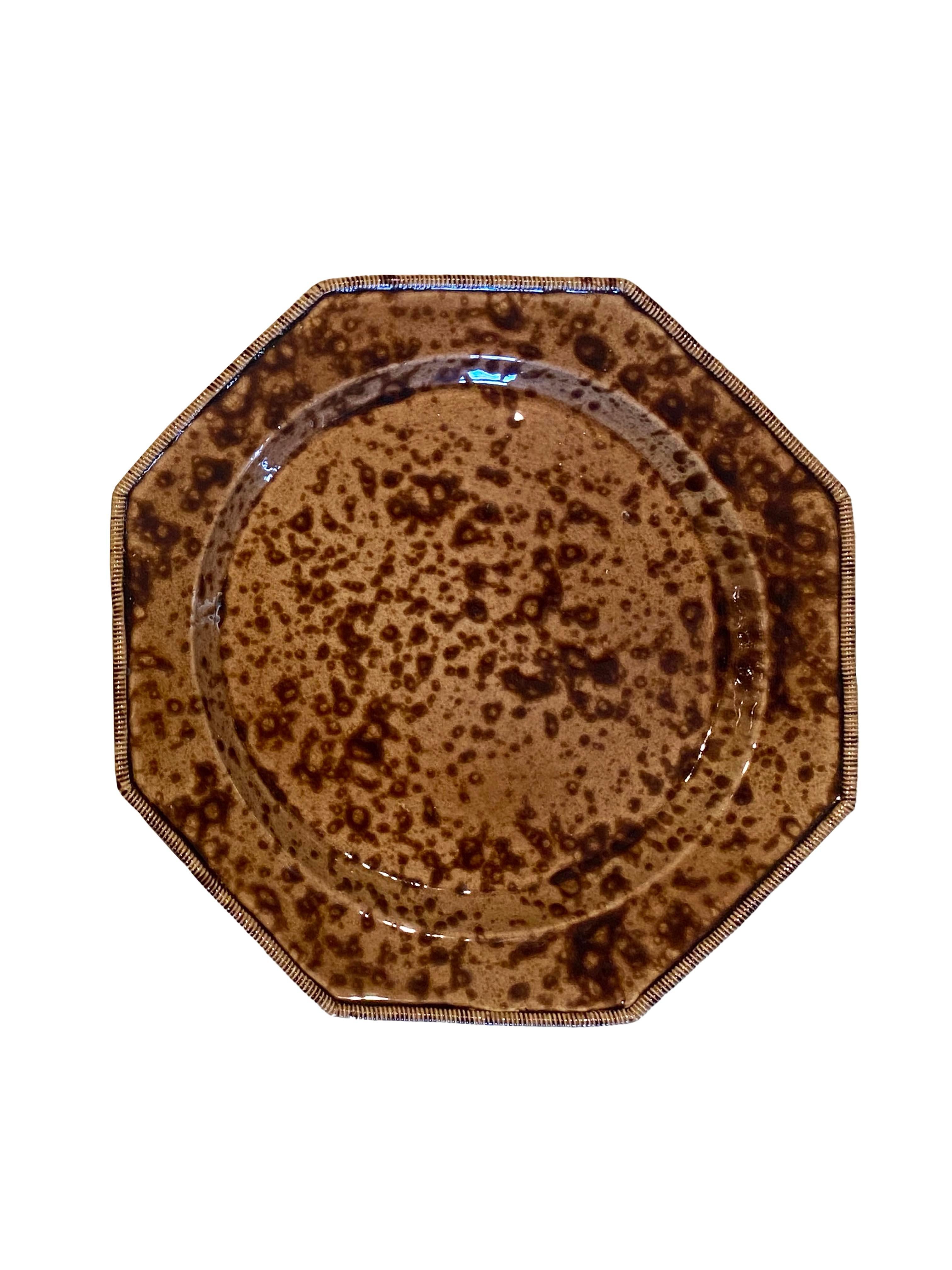 Elevate your dining experience with this exquisite set of 10 Italian octagonal shaped plates, each adorned with a hand-painted speckled tortoise shell-like pattern in rich tones of warm tans and browns. Perfectly versatile, these plates are ideal