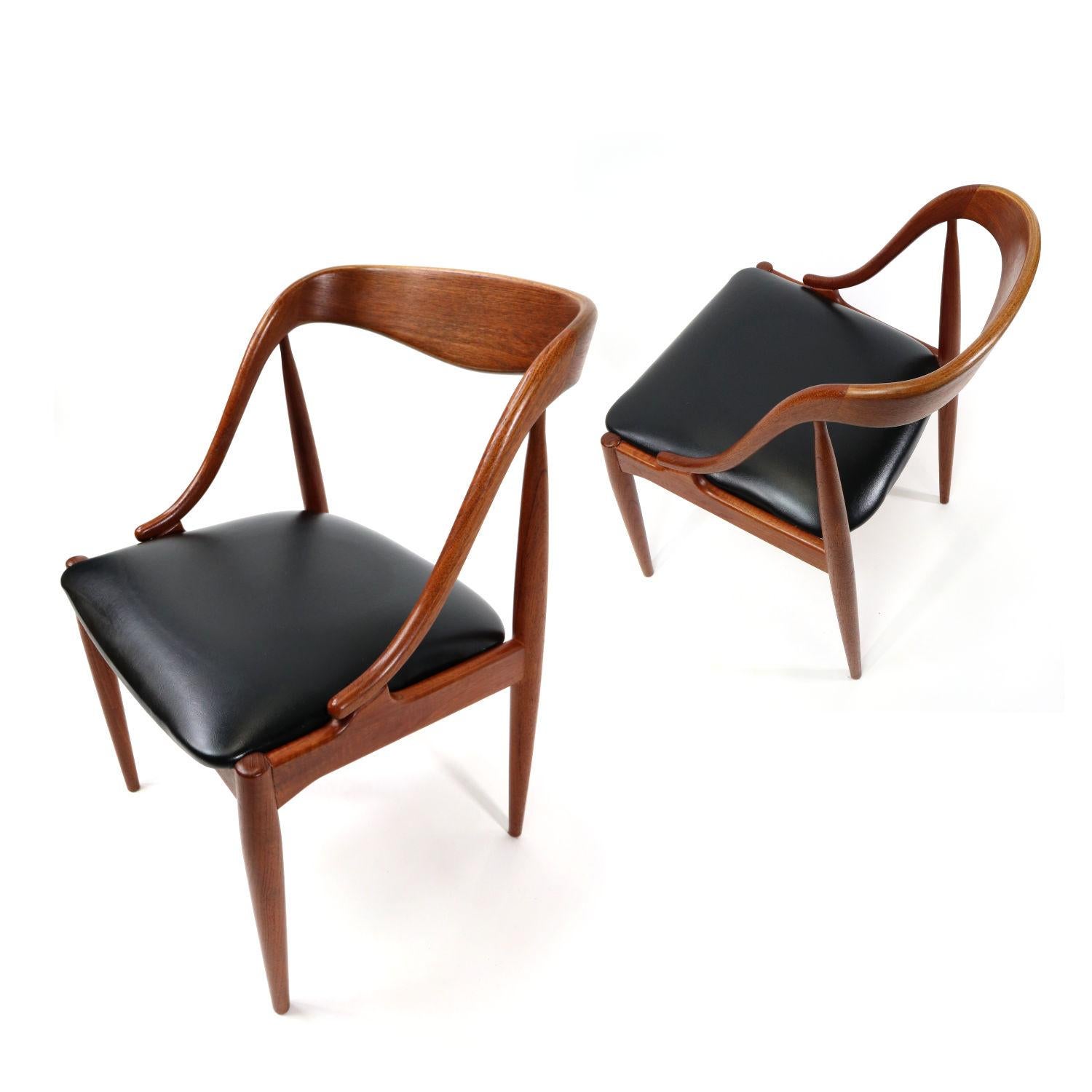 Absolutely exquisite set Mid-Century Modern Danish teak dining chairs. This set of 10 chairs was designed by Johannes Andersen for Uldum Møbelfabrik. The chairs are labeled beneath the seat. You don’t have to be a furniture pro to see how special