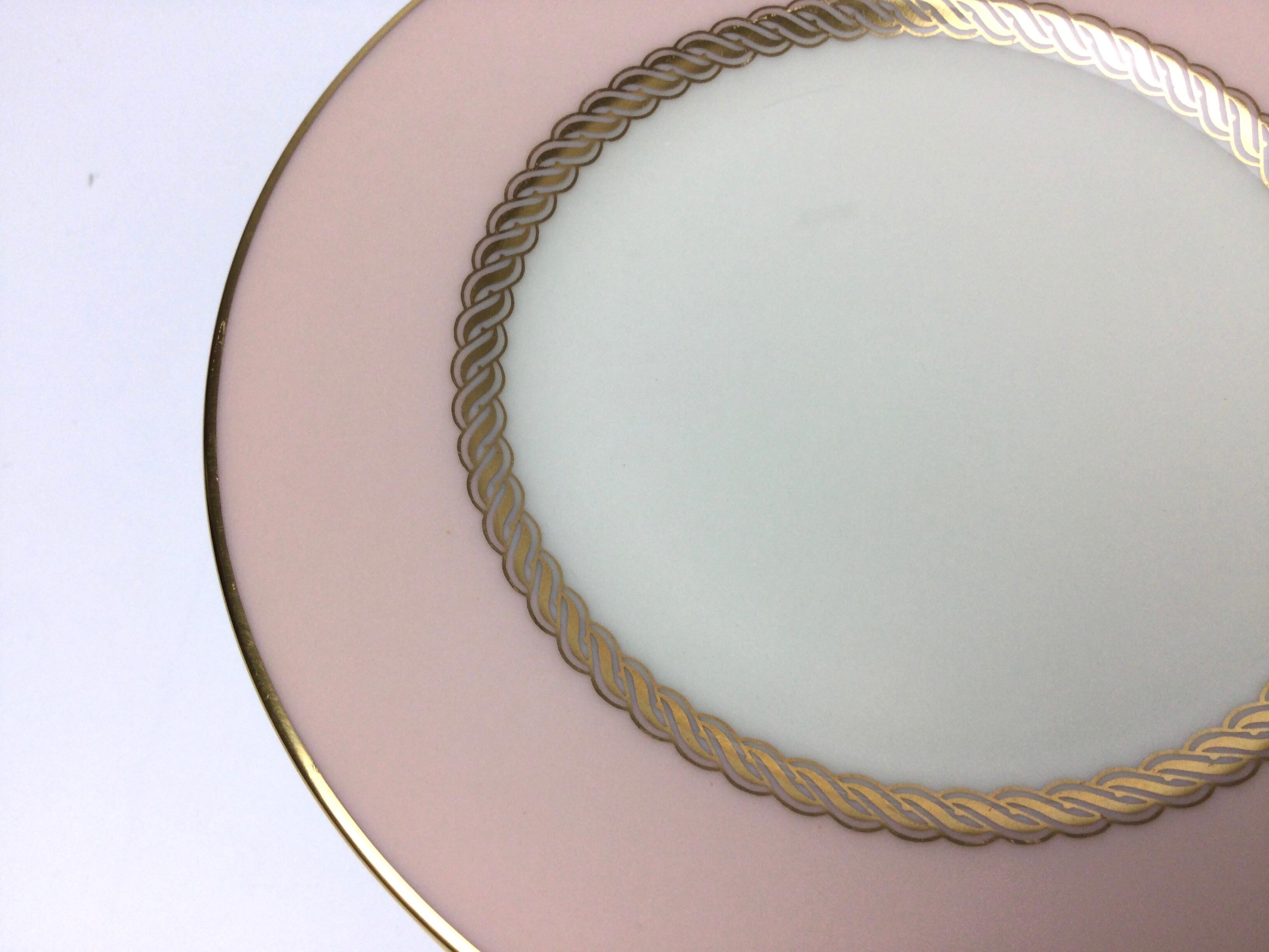 Set of 10 Lenox caribbee service bread plates with pink and gilt borders. 6 1/2