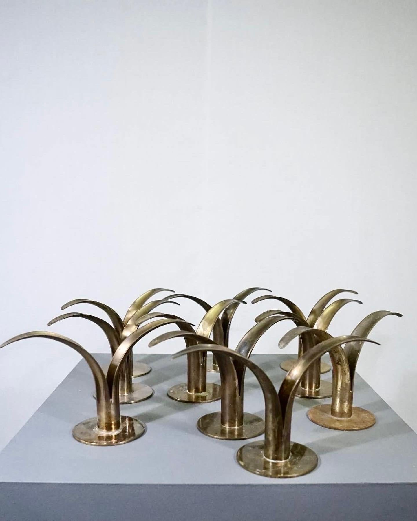 Scandinavian Modern Set of 10 lily candle holders designed by Ivar Ålenius Björk for Ystad Metal For Sale
