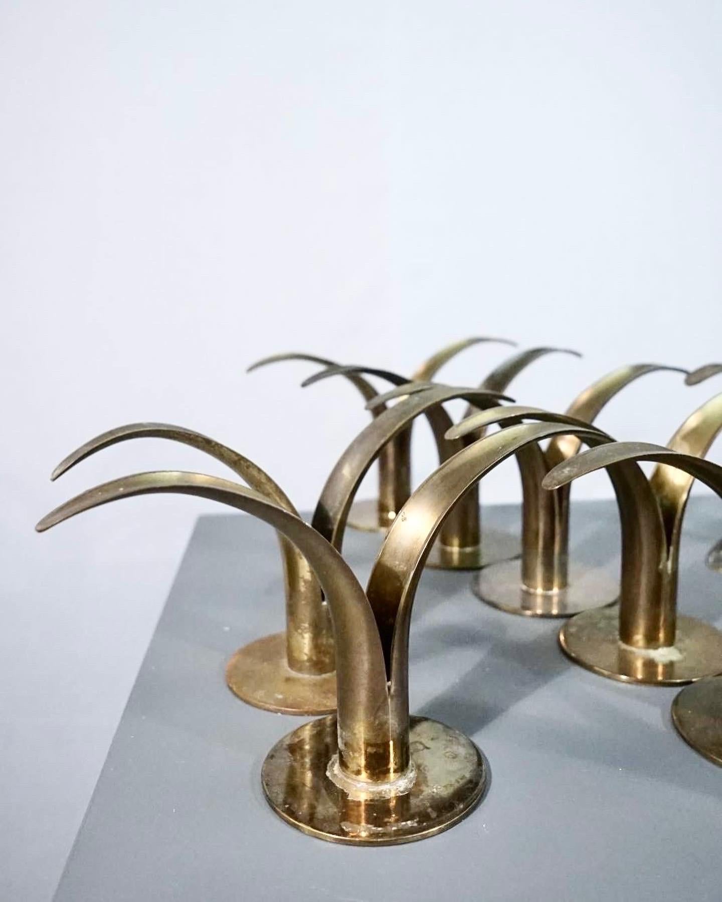 Set of 10 lily candle holders designed by Ivar Ålenius Björk for Ystad Metal In Good Condition For Sale In Valby, 84