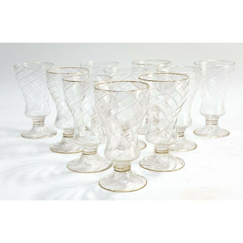 Set of 10 Lobmeyr Germany swirled glass water Goblets, Gilt Rims, circa 1900

10 Lobmeyr Germany swirled glass water goblets, circa 1900. A continuous swirl pattern from the base to the stem and up to the bowl. With Gilt highlights. Signed to 4