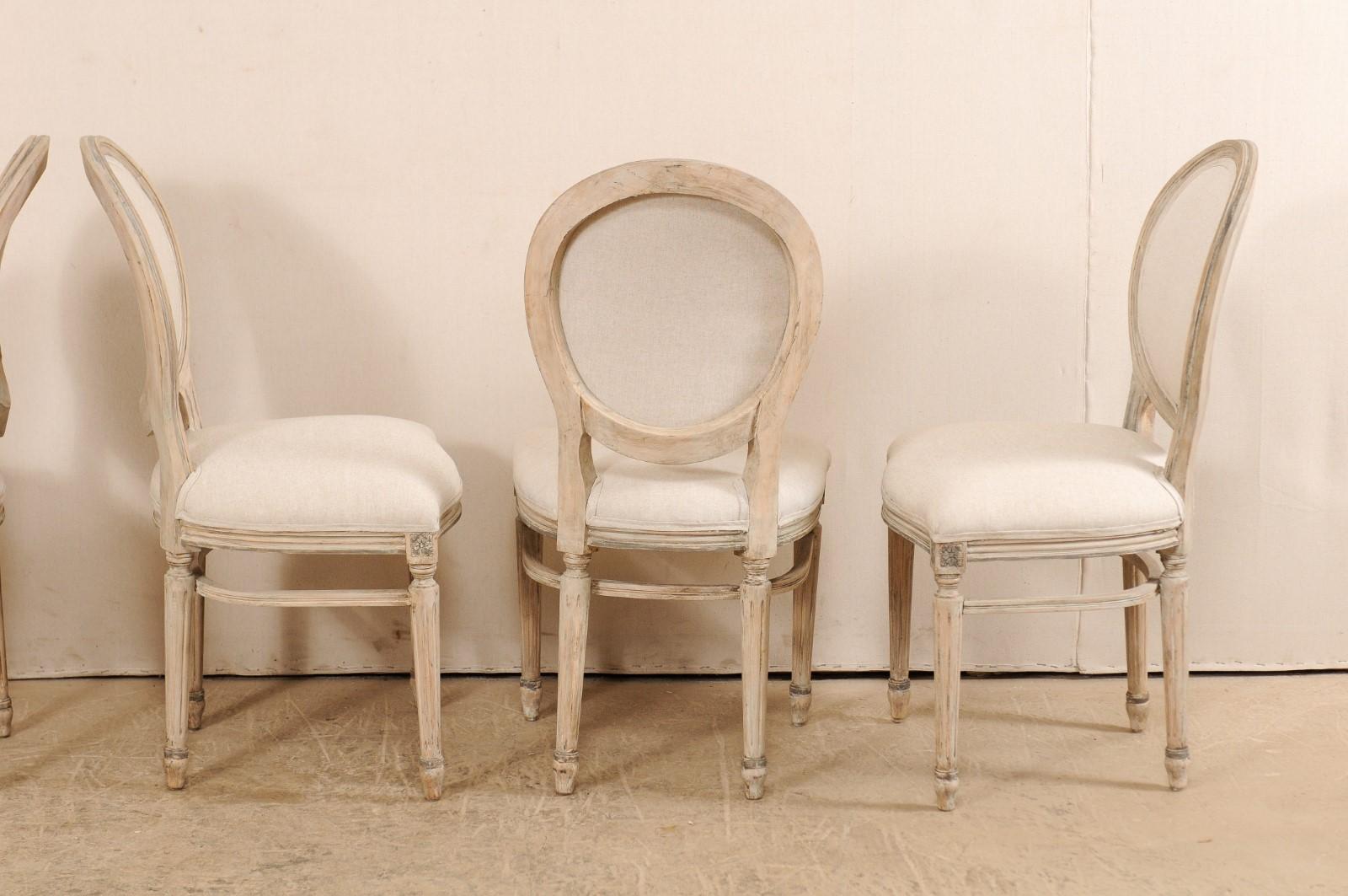 Set of 10 Louis XVI Style Upholstered and Carved Wood Oval-Backed Dining Chairs 4