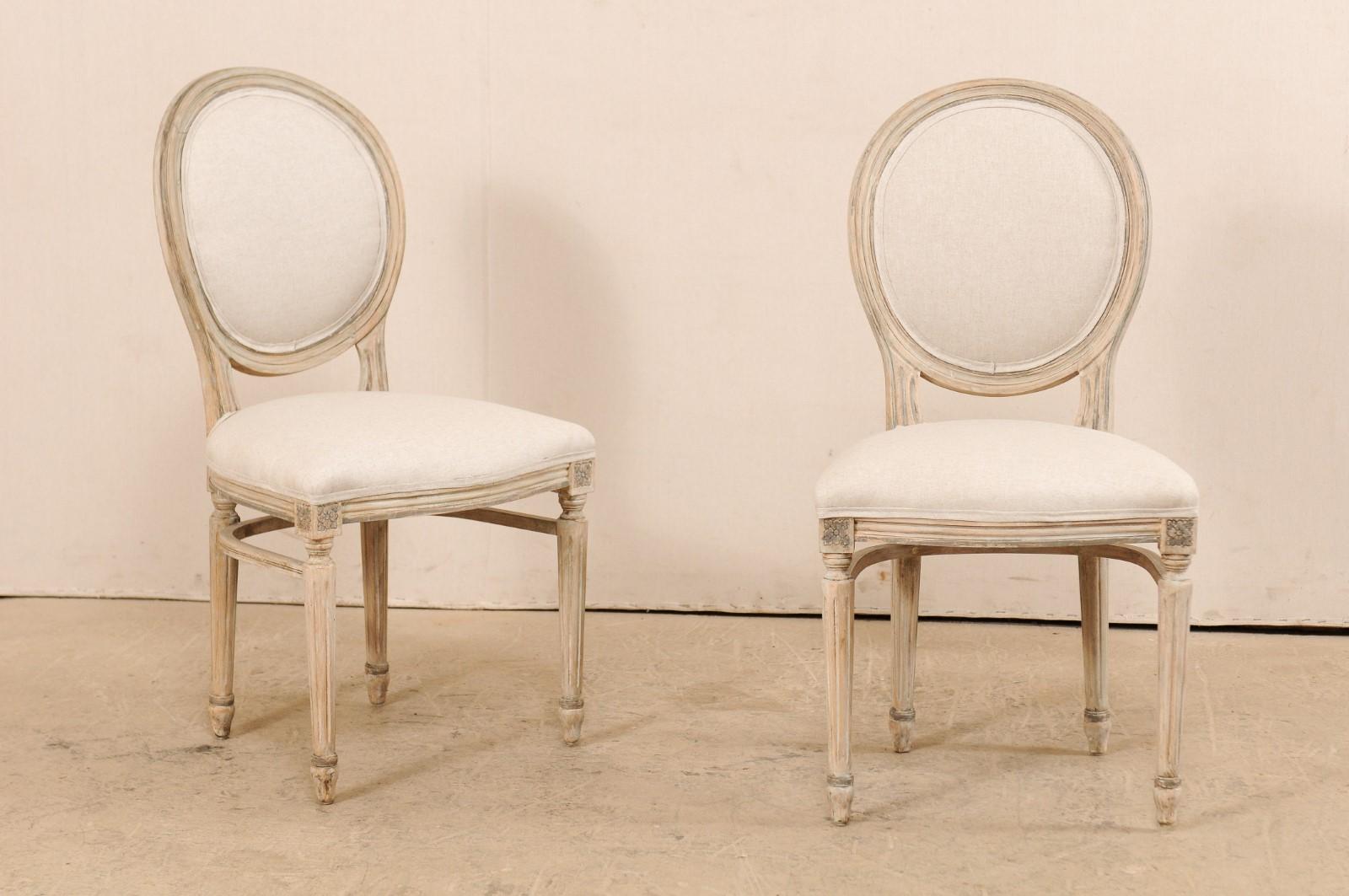 20th Century Set of 10 Louis XVI Style Upholstered and Carved Wood Oval-Backed Dining Chairs