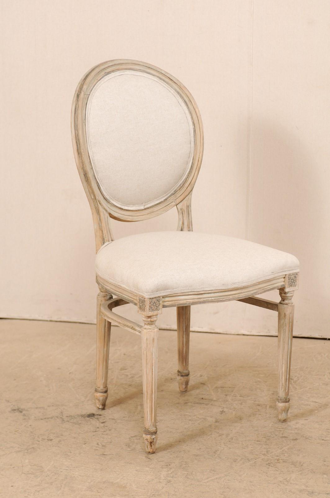 Upholstery Set of 10 Louis XVI Style Upholstered and Carved Wood Oval-Backed Dining Chairs