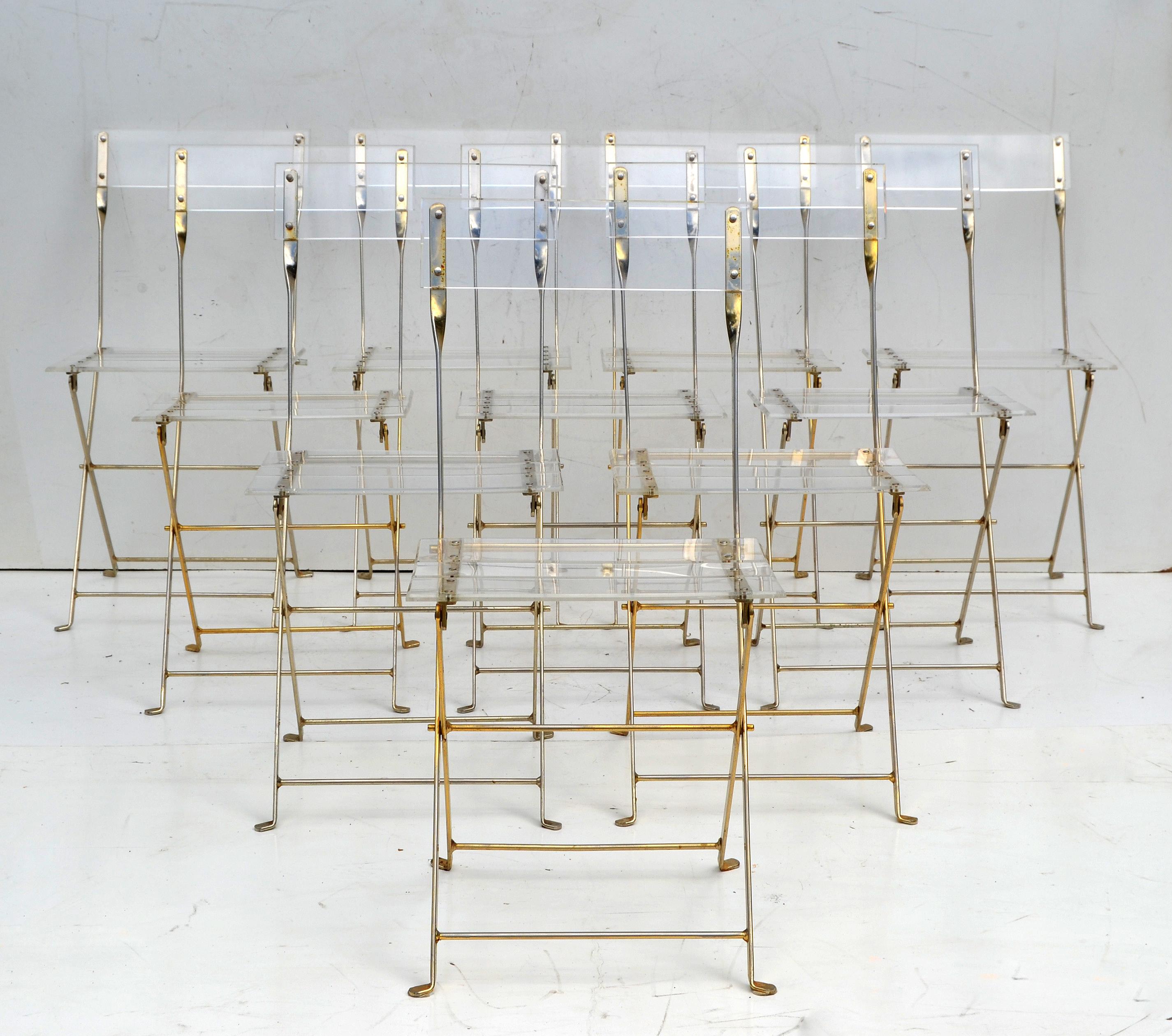 Fantastic set of 10 Lucite folding chairs by Yonel Lebovici, in brass plated steel and Lucite. 
For Marais International, Edition du Marais.
Circa 1970.

Measure folded: height: 38.63 x 15.75 x 3.75 depth.