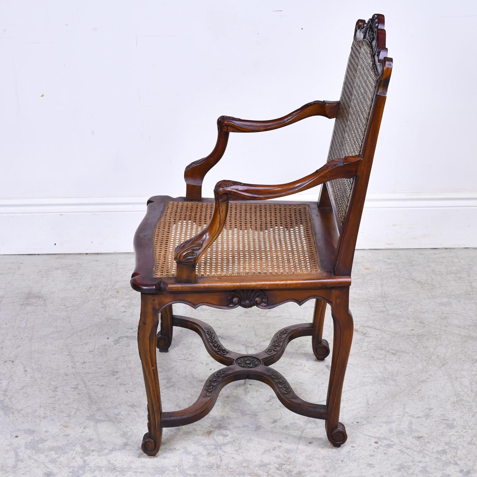 Carved Set of 10 LXVI Chairs with Pair of Arms and 8 Side Chairs, Caned Seat and Back