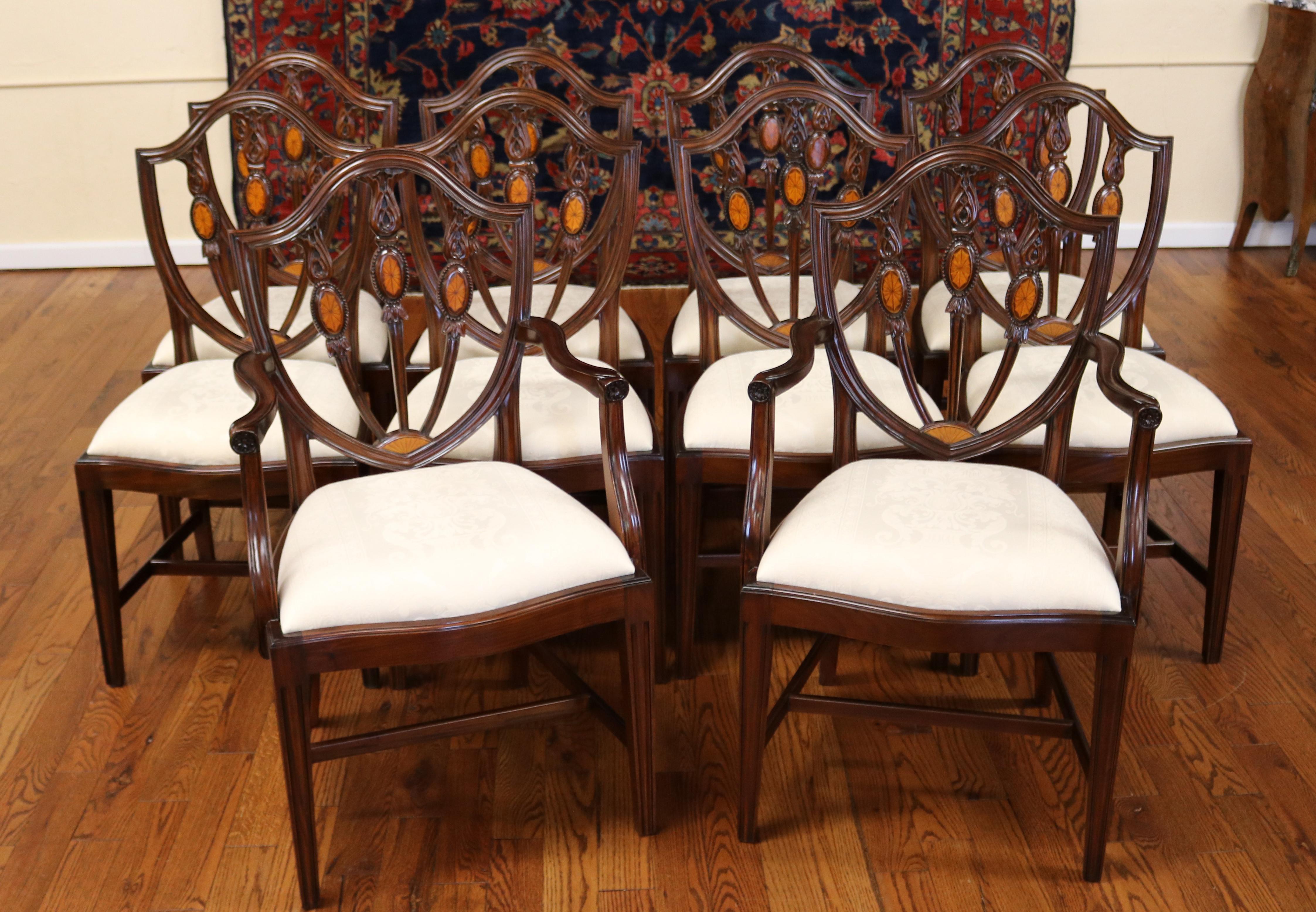 Set of 10 Mahogany Satinwood Inlaid Baltimore Federal Style Dining Chairs

Dimensions : chairs measure 40 tall x 24 wide x 23 deep seat height 19 

These gorgeous inlaid chairs are definitely a cut above what we commonly see available in the market.