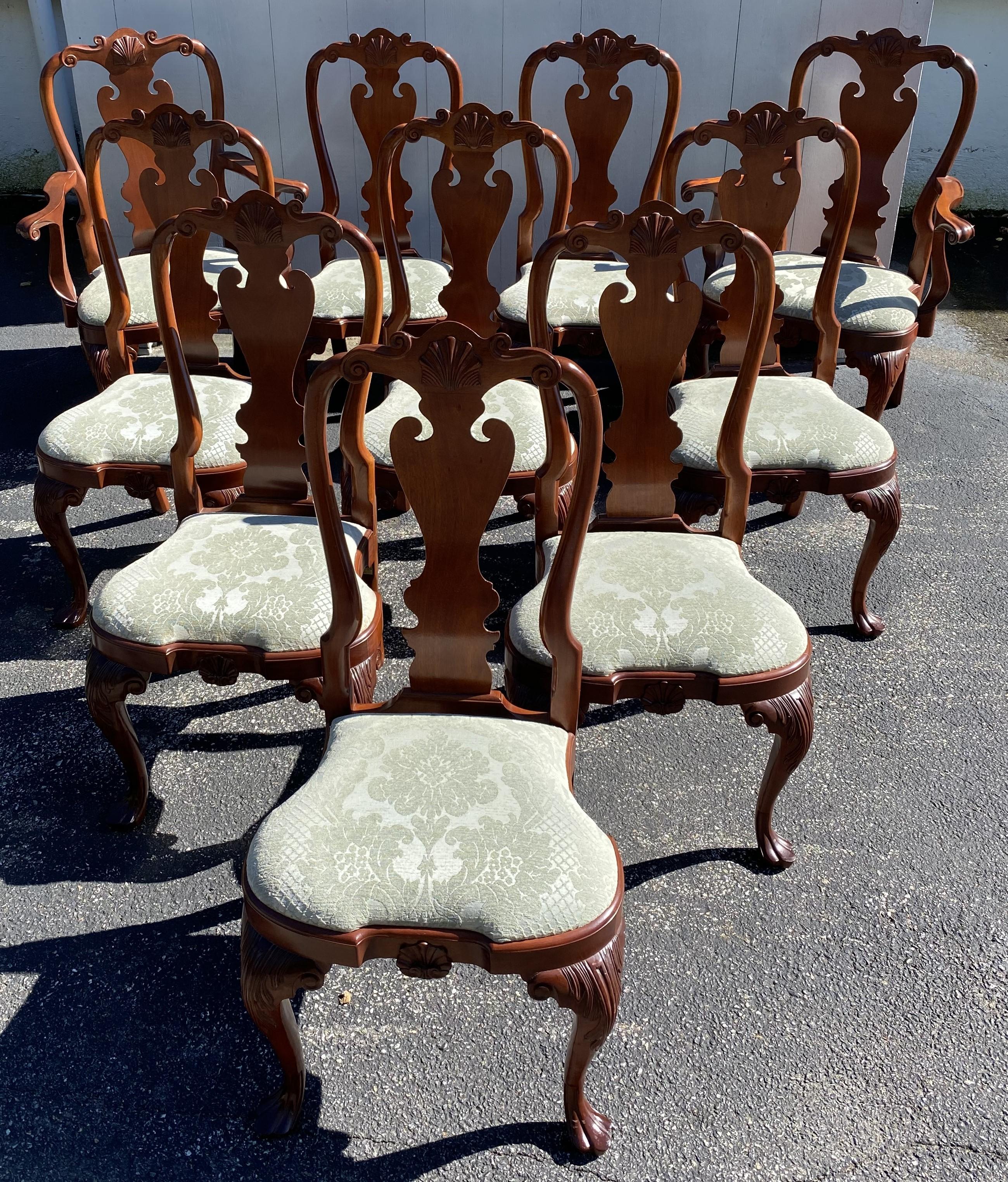 A wonderful set of ten mahogany Colonial Williamsburg Reserve Collection Queen Anne style dining chairs by Stickley including two armchairs and eight side chairs, with shell carved crests, shaped splats, scrolled arms, acanthus carved cabriole legs