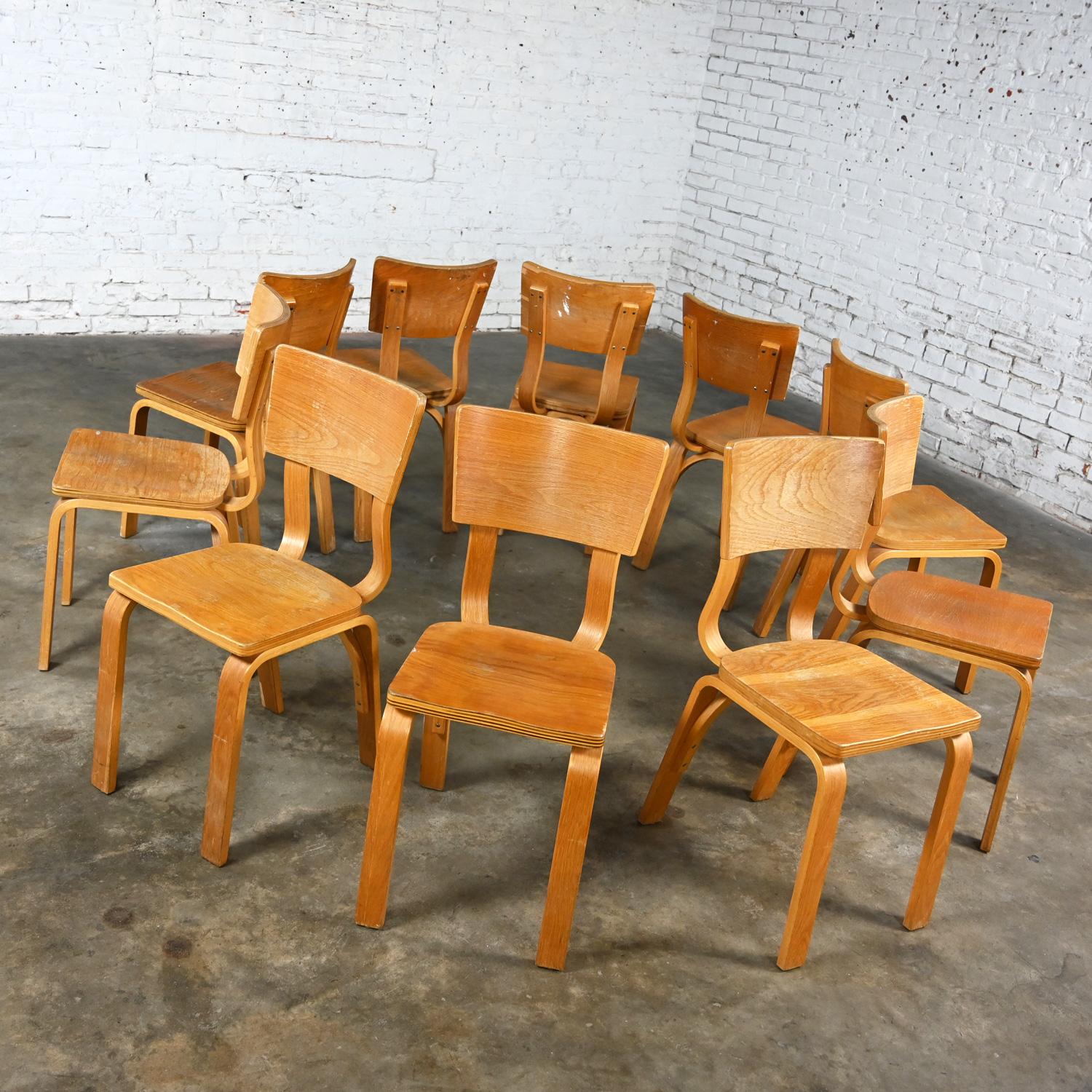 Set of 10 MCM Thonet #1216 Dining Chairs Bent Oak Plywood Saddle Seat Single Bow In Good Condition For Sale In Topeka, KS