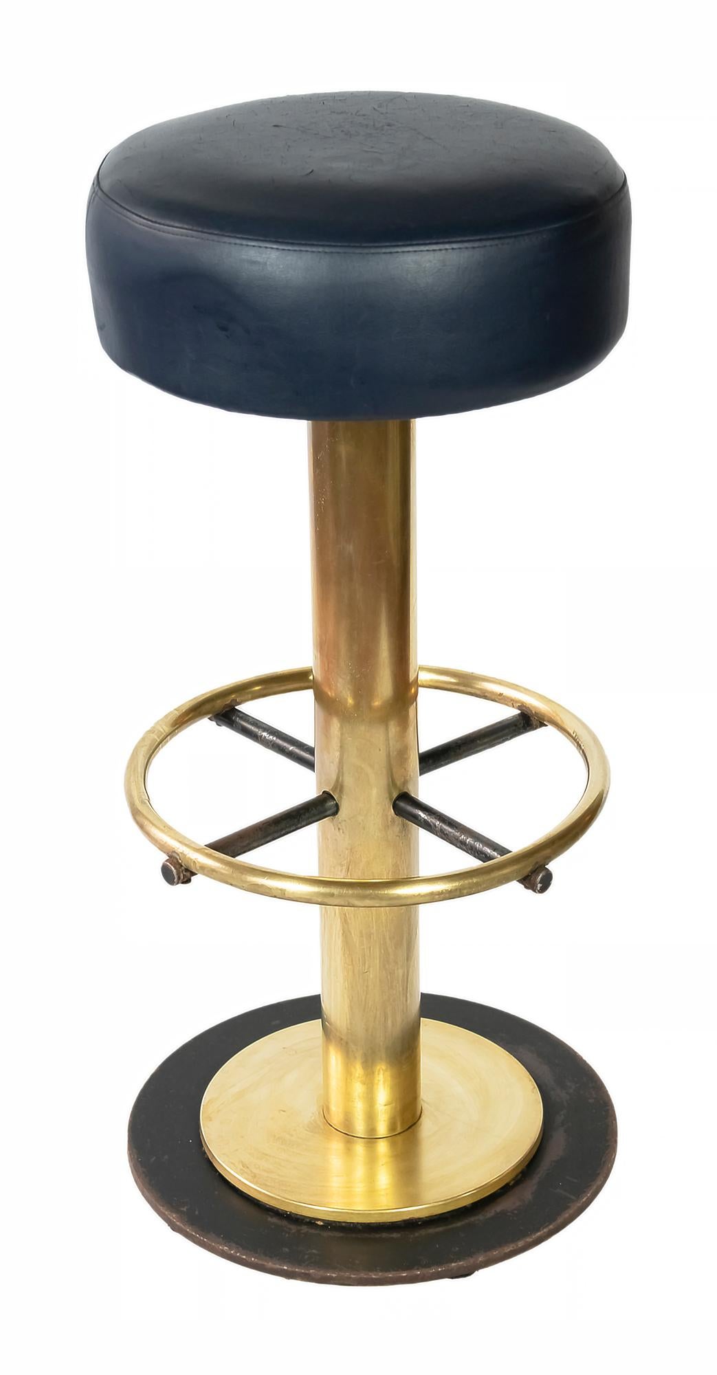 Set of 10 pcs. Mid-Century Italian swivel bar stools/chairs.
The base is made of brass and steel with dark blue leatherette upholstery.
Each stool weights 27 kg.
Very good vintage condition.