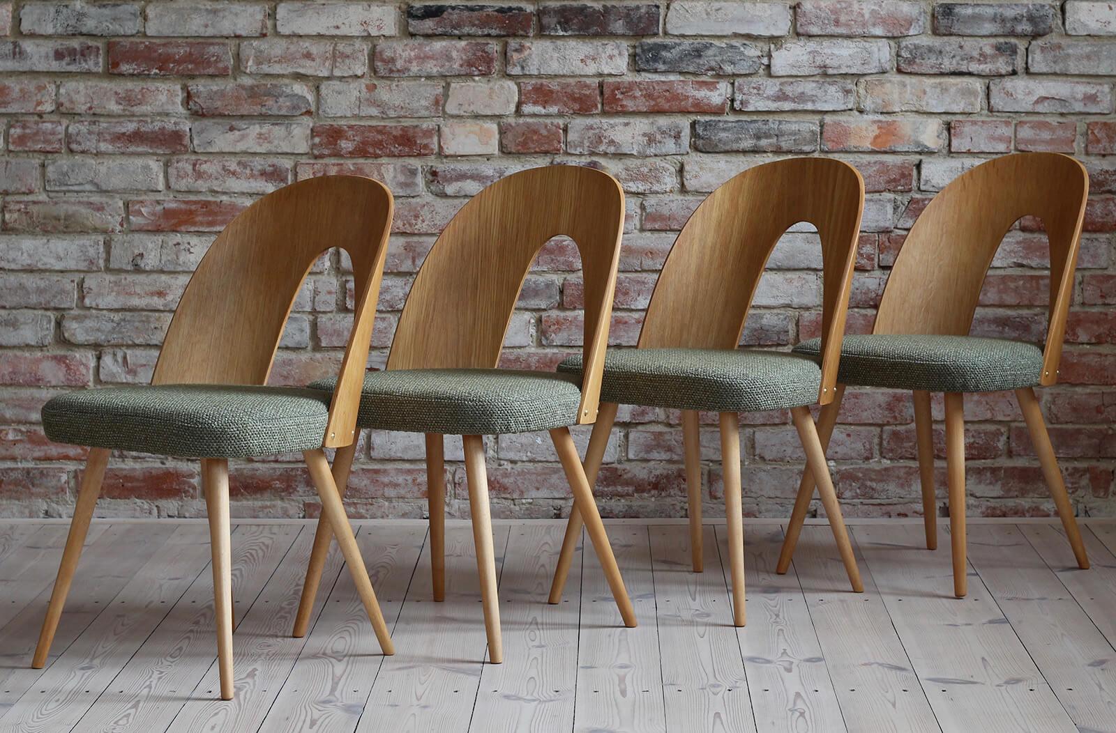 This set of ten vintage dining chairs was designed by Czech designer Antonin Šuman in the 1960s. The chairs have been completely restored finished with high-quality oil that gave them beautiful and natural finish. This set is reupholstered with