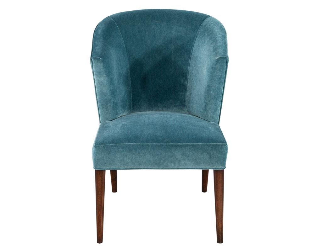 Set of 10 custom monica dining chairs in designer velvet. Unique sleek modern shaped dining chair, custom made in Canada. Upholstered in a turquoise blue designer velvet with rich walnut finished legs. Chairs can be custom ordered in different