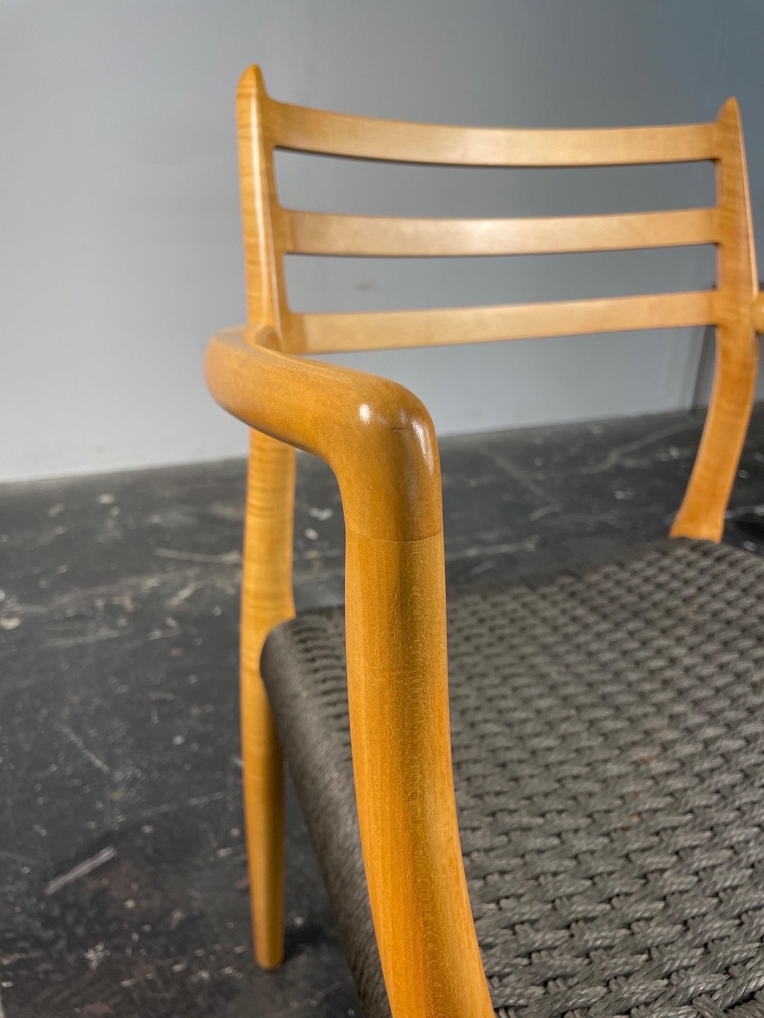 Mid-20th Century Set of 10 Moller Model #78 and #62 in Tiger Maple & Black Paper Cord. For Sale