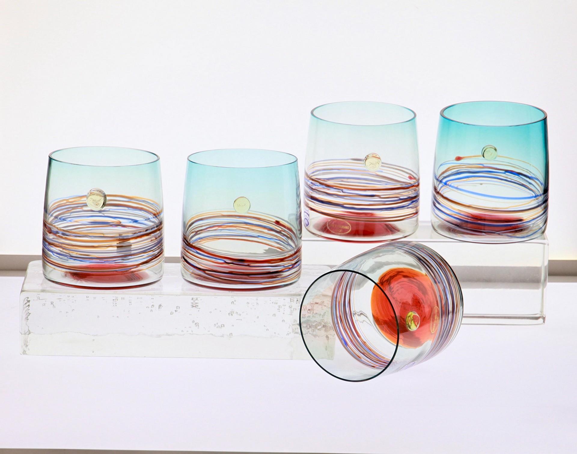 Set of tumblers from Cenedese, made in Murano. Labelled and signed.

For a glass lover and collector.
Each glass has a sfumato technique, striping, a bottom incalmo and a dot. This sum of techniques creates a vibrant and fresh design.
Uses