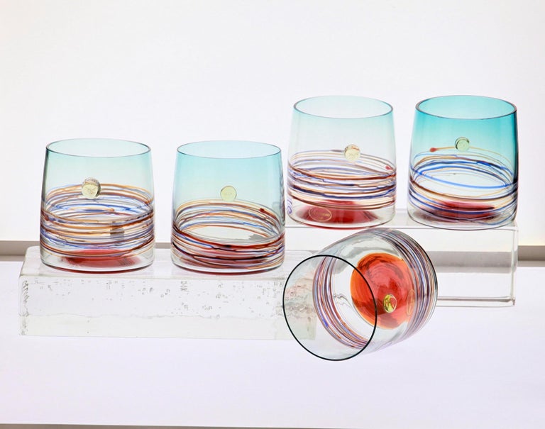 Set of tumblers from Cenedese, made in Murano. Labelled and signed.

For a glass lover and collector.
Each glass has a sfumato technique, striping, a bottom incalmo and a dot. This sum of techniques creates a vibrant and fresh design.
Uses