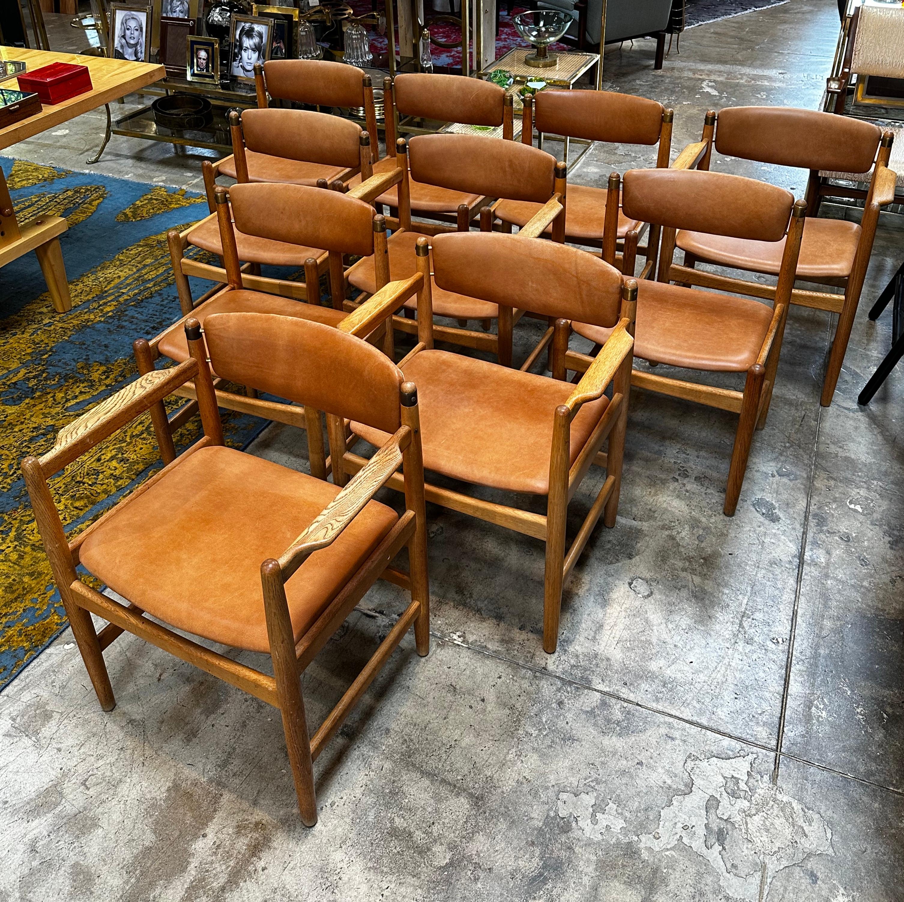 This set of four Model 537 oresund chairs was designed by Borge Mogensen for Karl Andersson & Söner. It has been in production since 1955. These chairs stem from the first production period. The design was inspired by American Shaker furniture. It