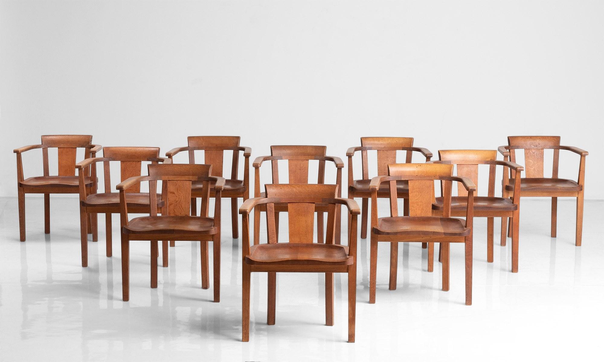 Set of (10) oak dining chairs by Gordon Russell.

England, circa 1930.

Made by Gordon Russell for The Downs Malvern in Herefordshire in the Thirties.

22.5”L x 19”D x 28.25”H x 16.5”seat.