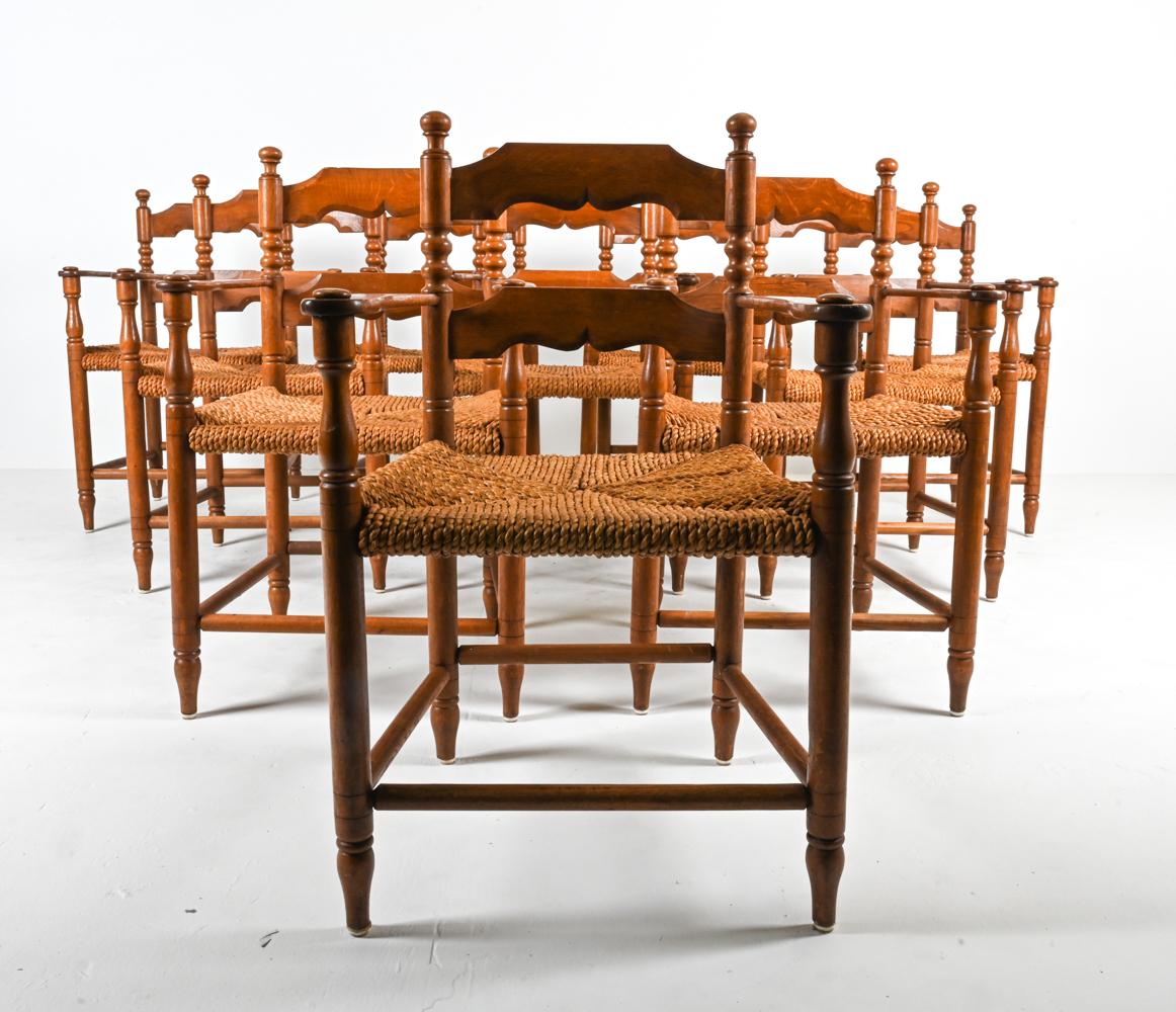 Rustique Ensemble de 10 fauteuils en chêne et cordon papier à la manière de Charles Dudouyt en vente