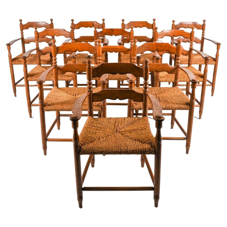 Ensemble de 10 fauteuils en chêne et cordon papier à la manière de Charles Dudouyt en vente