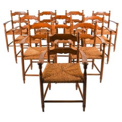 Ensemble de 10 fauteuils en chêne et cordon papier à la manière de Charles Dudouyt