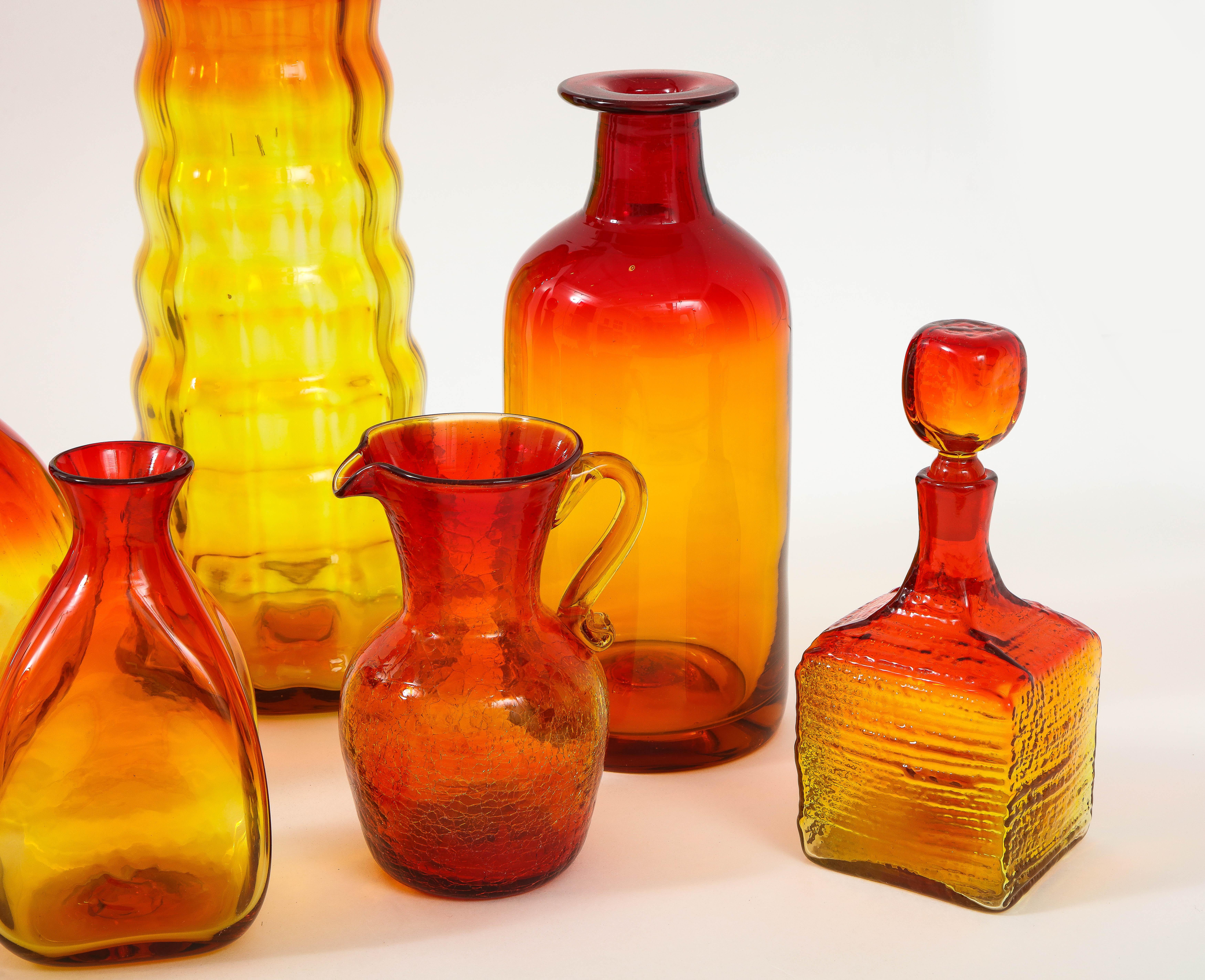 Mid-Century Modern Set of 10 Orange Blenko Bottles For Sale