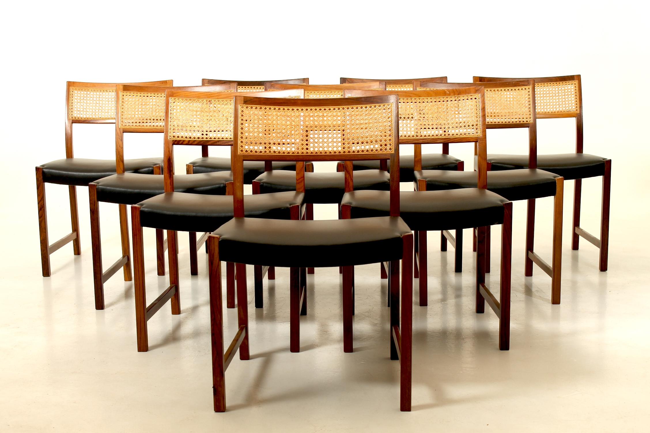 Unique and large set of 10 side chairs in rosewood, rattan and new leather. Designed by Illum Wikkelsø and manufactured by CFC Silkeborg, Denmark. 
