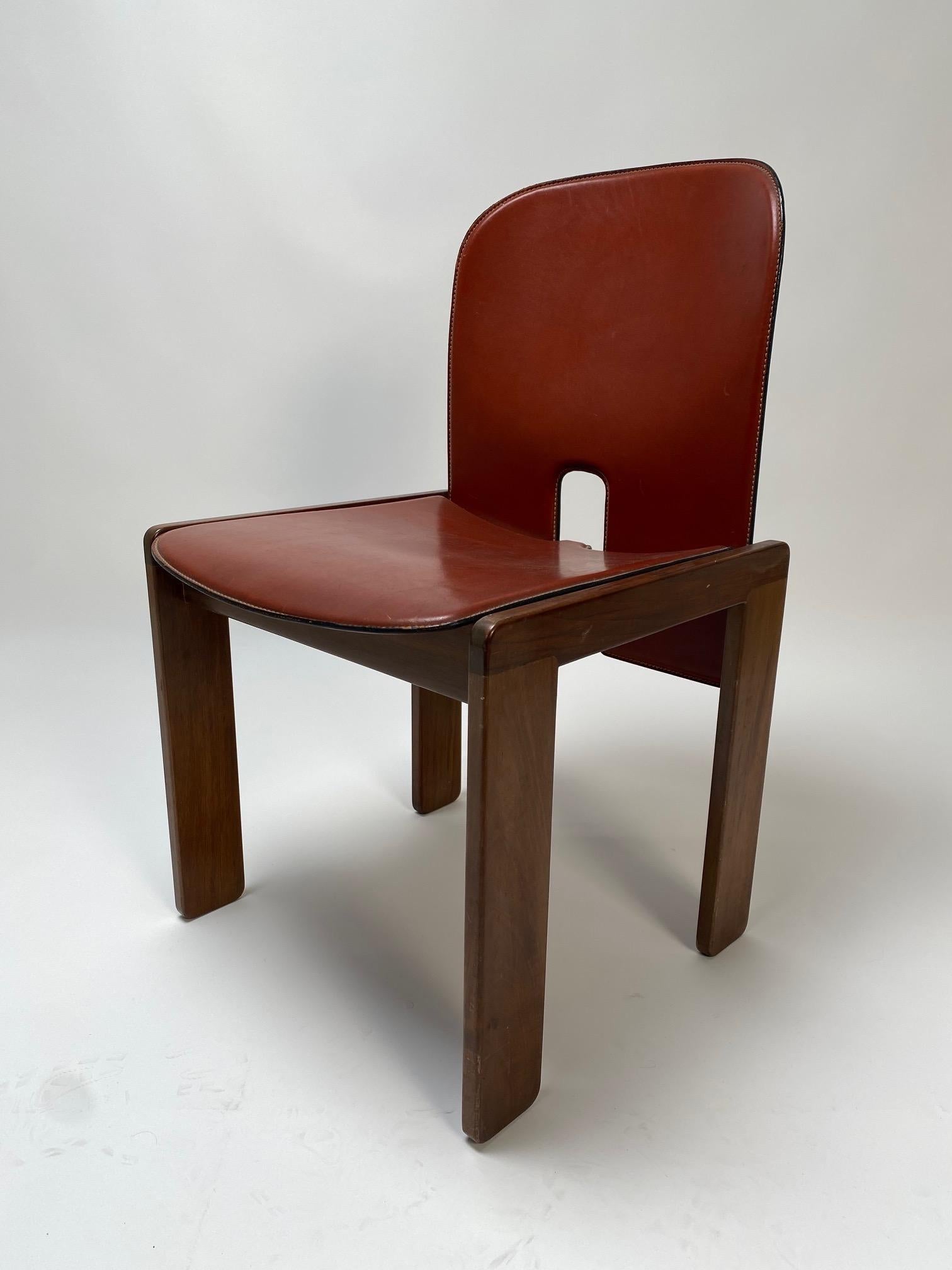 Afra and Tobia Scarpa, set of 10 leather and wood chairs made for Cassina, Italy, 1967.

It is one of the icons of Italian design, a perfect piece of furniture to be used as dining chairs but also for study or office.
The chairs are perfectly