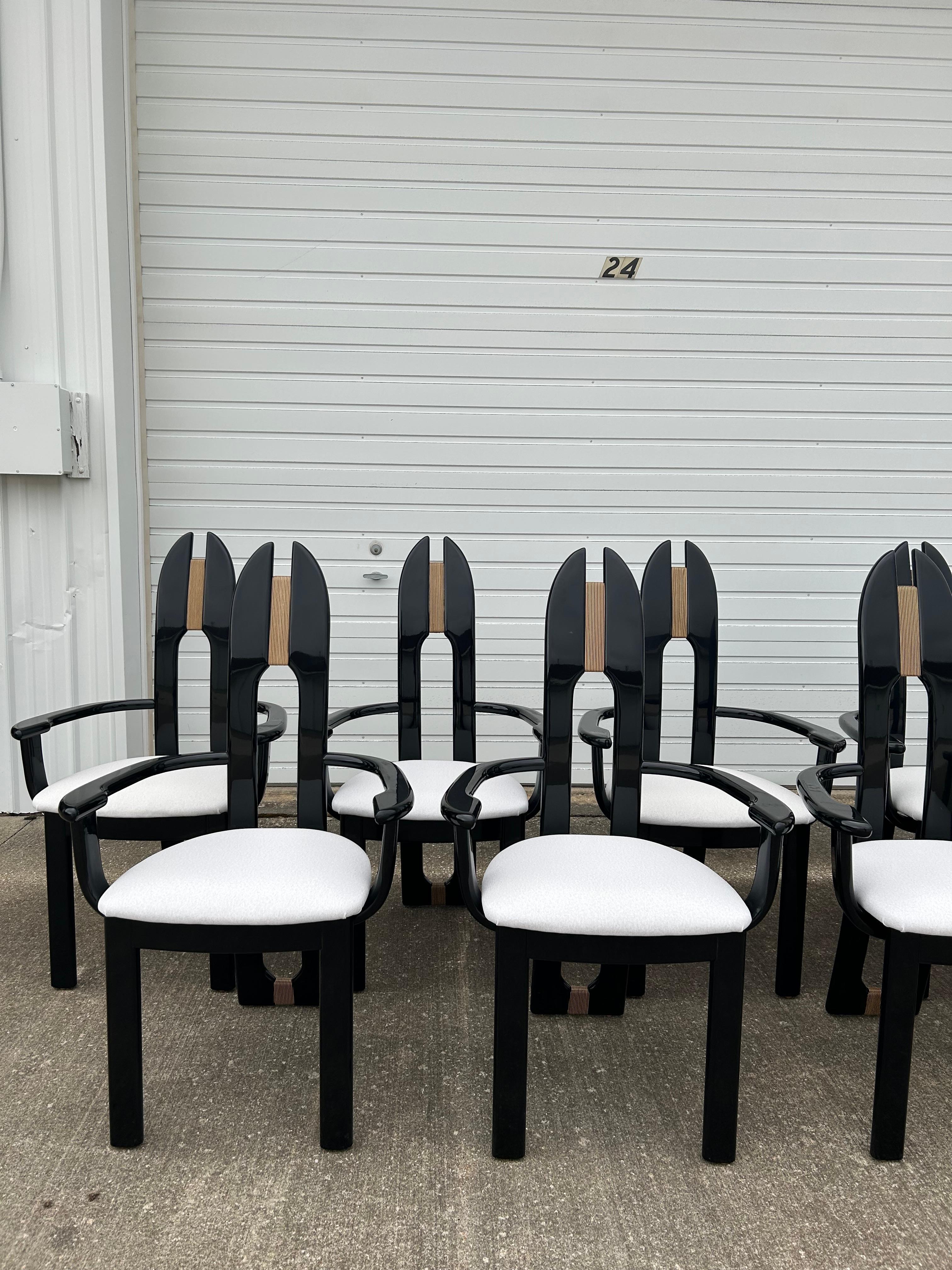Set of 10 Italian Avant Garde Dining Armchairs by Pietro Costantini. These chairs are reupholstered in JF Fabrics “Woolish” fabric. It is a soft velvet with a faux wool look, finished with a FibreGaurd stain free technology. The beach wood frames