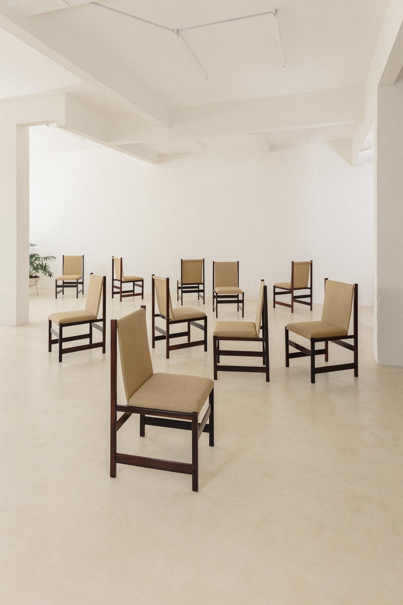 This gorgeous set is composed of ten chairs produced by the Brazilian company Celina Decorações in the 1960s. Chairs are made of solid Rosewood, with seats and backs upholstered with 100% Organic Silk fabric from our collection Bossa Fabrics. The